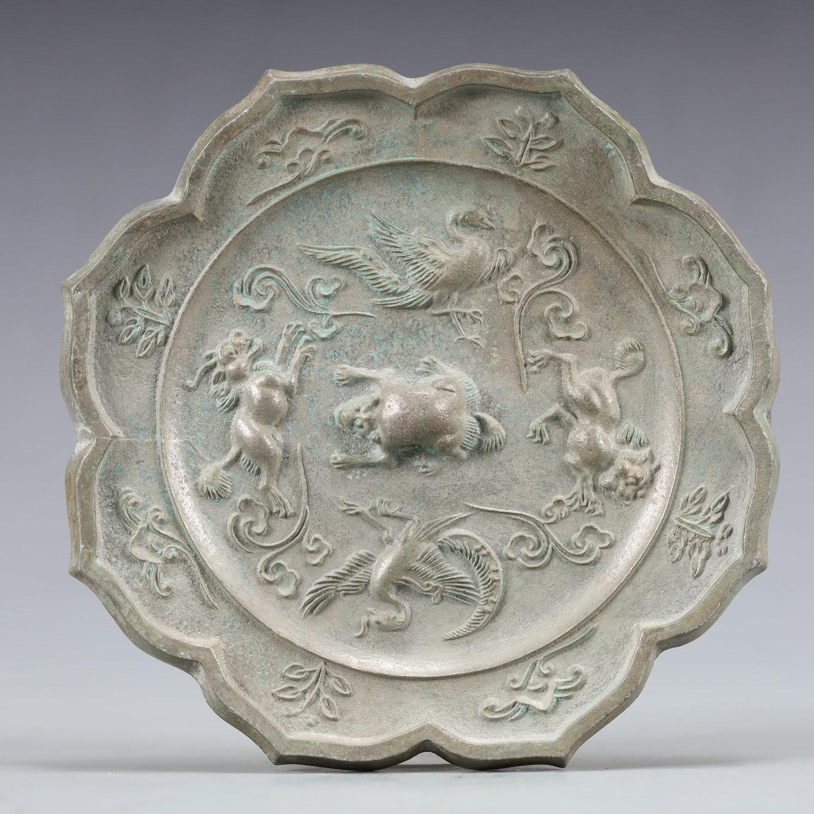 An Archaic Bronze Animal Pattern Mirror: An Archaic Bronze Animal Pattern Mirror,Ancient Time, China,Size:5.5inx0.4in Weight:468.4g 青铜动物纹铜镜,中国远古时期