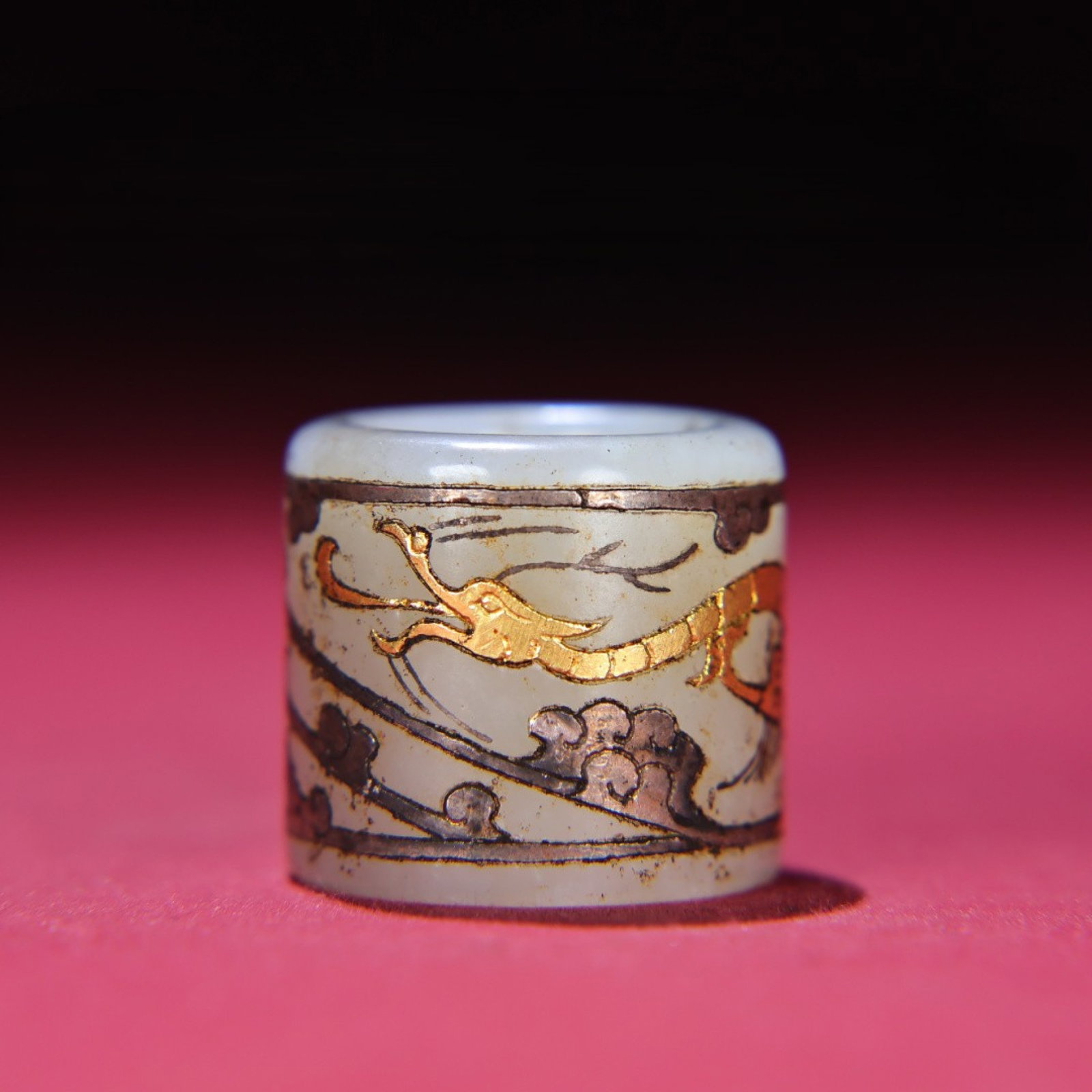 An Exquisite White Jade Inlaid Gold and Silver Dragon and Phoenix Pattern Thumb Ring: An Exquisite White Jade Inlaid Gold and Silver Dragon and Phoenix Pattern Thumb Ring,Qing Dynasty,China,Size:1.4inx1.3inx0.9in,Weight:50g 白玉错金银龙凤ಬ