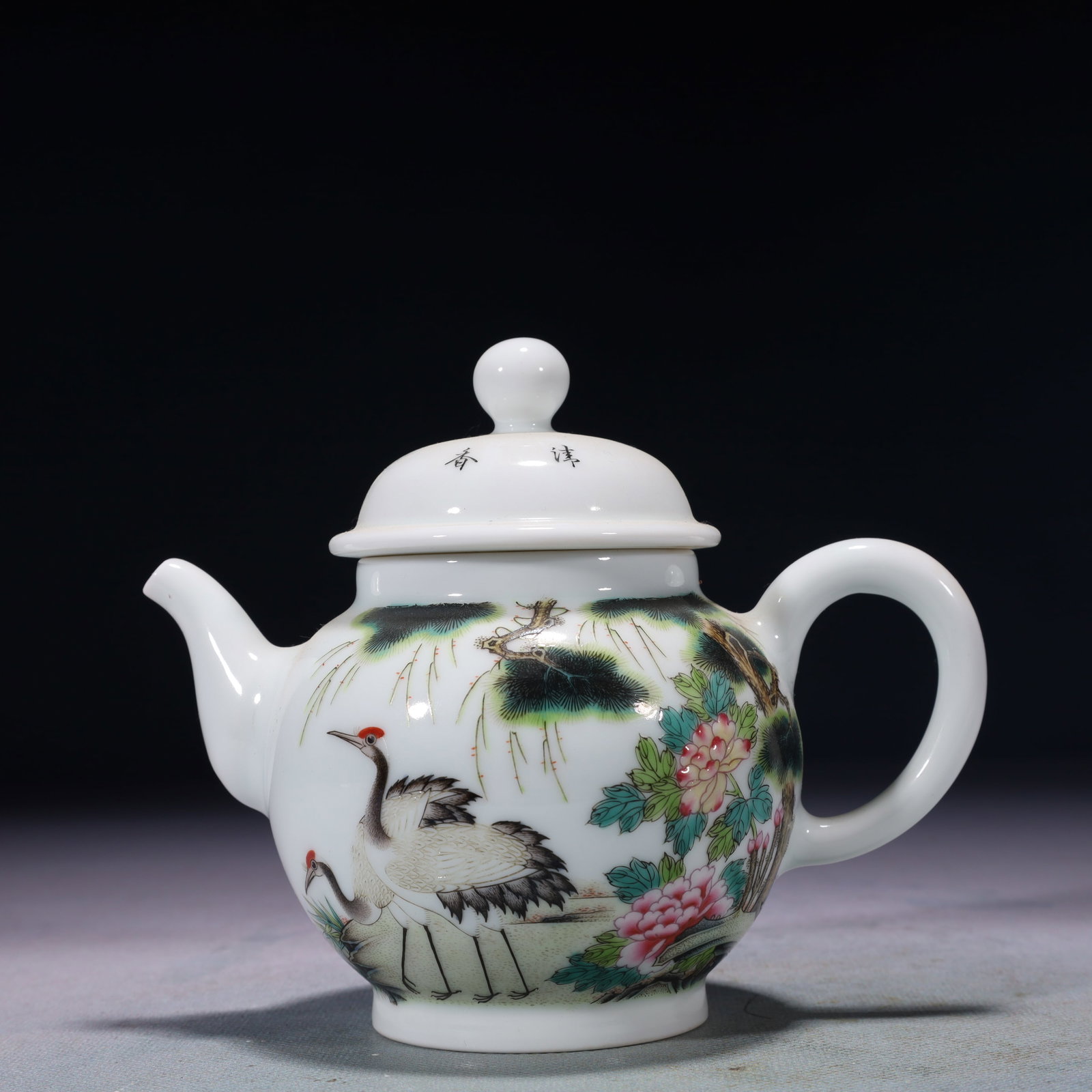 An Exquisite Famille-Rose Pine and Crane Pattern Teapot,with poem: An Exquisite Famille-Rose Pine and Crane Pattern Teapot,with poem,Qing Dynasty,China,Yongzheng Four-character Mark,Size:5.9inx3.5inx4.7in,Weight:250g 粉彩松鹤纹茶&#