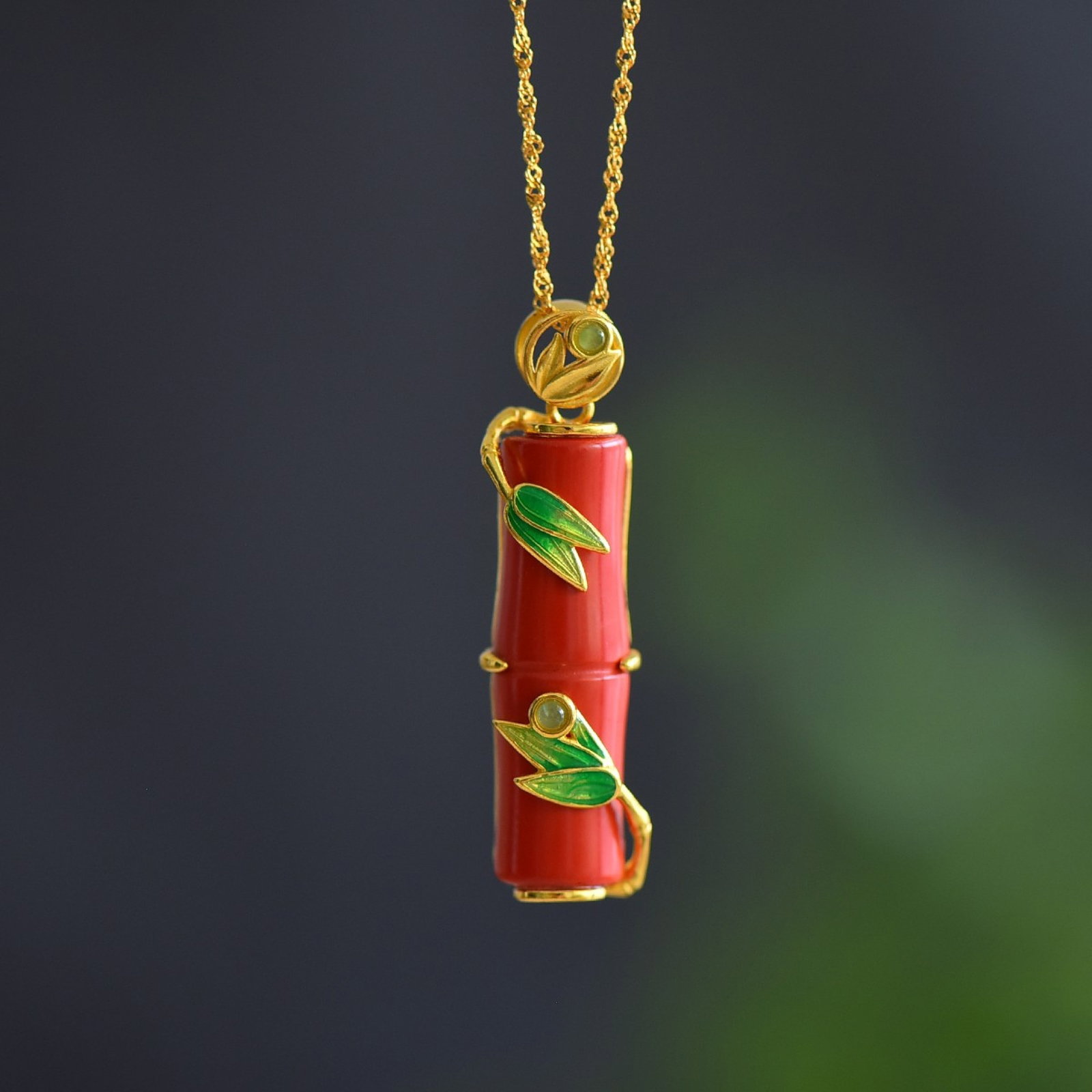 An Exquisite Sterling Silver-Gold Plated Inlaid Cinnabar Pendant: An Exquisite Sterling Silver-Gold Plated Inlaid Cinnabar Pendant,Size:0.4inx1.3in 寓意:节节高升,竹报平安 纯银镀金