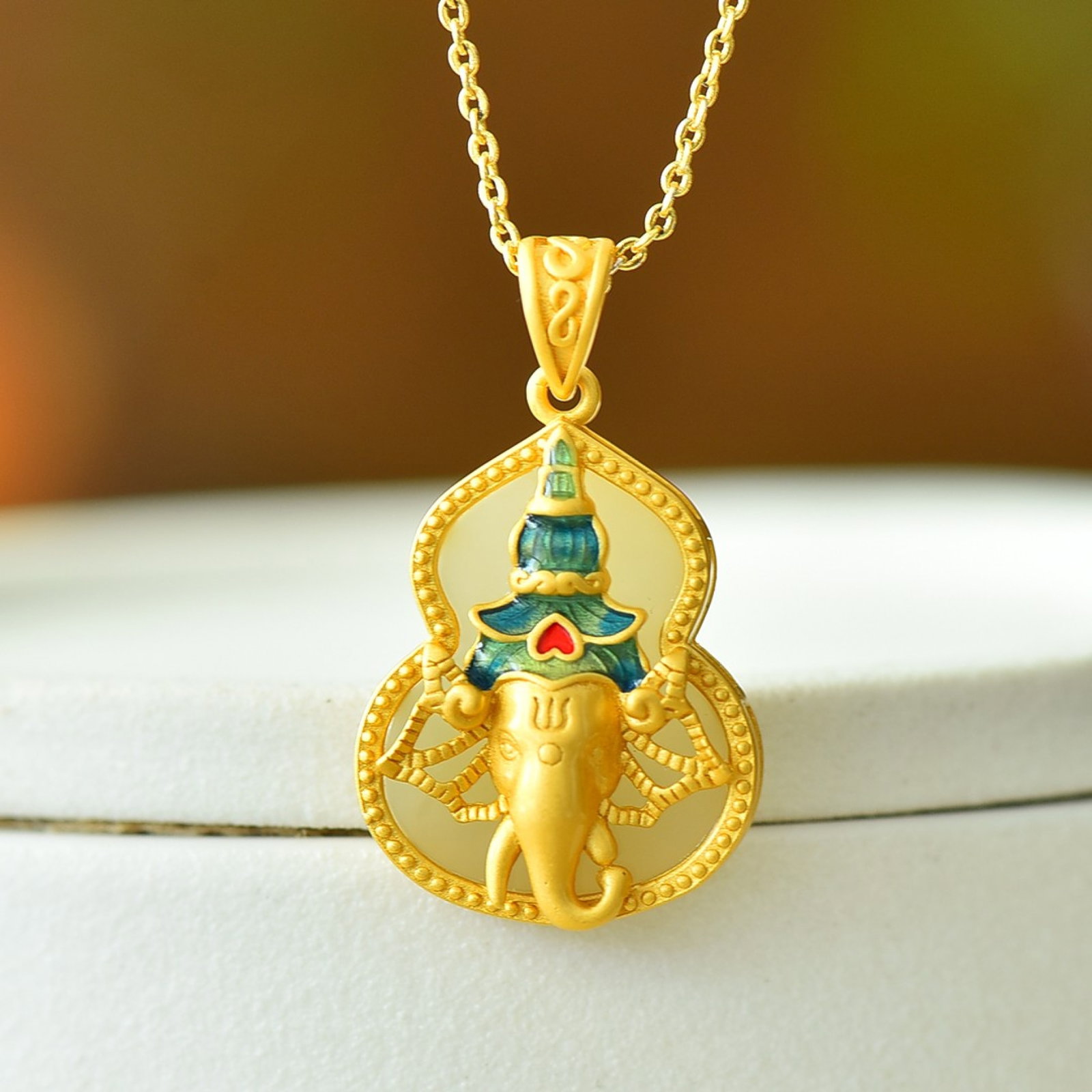 An Exquisite Sterling Silver-Gold Plated Inlaid White Jade Enamel Gourd Pendant: An Exquisite Sterling Silver-Gold Plated Inlaid White Jade Enamel Gourd Pendant 纯银镀金镶白玉珐琅葫芦吊坠