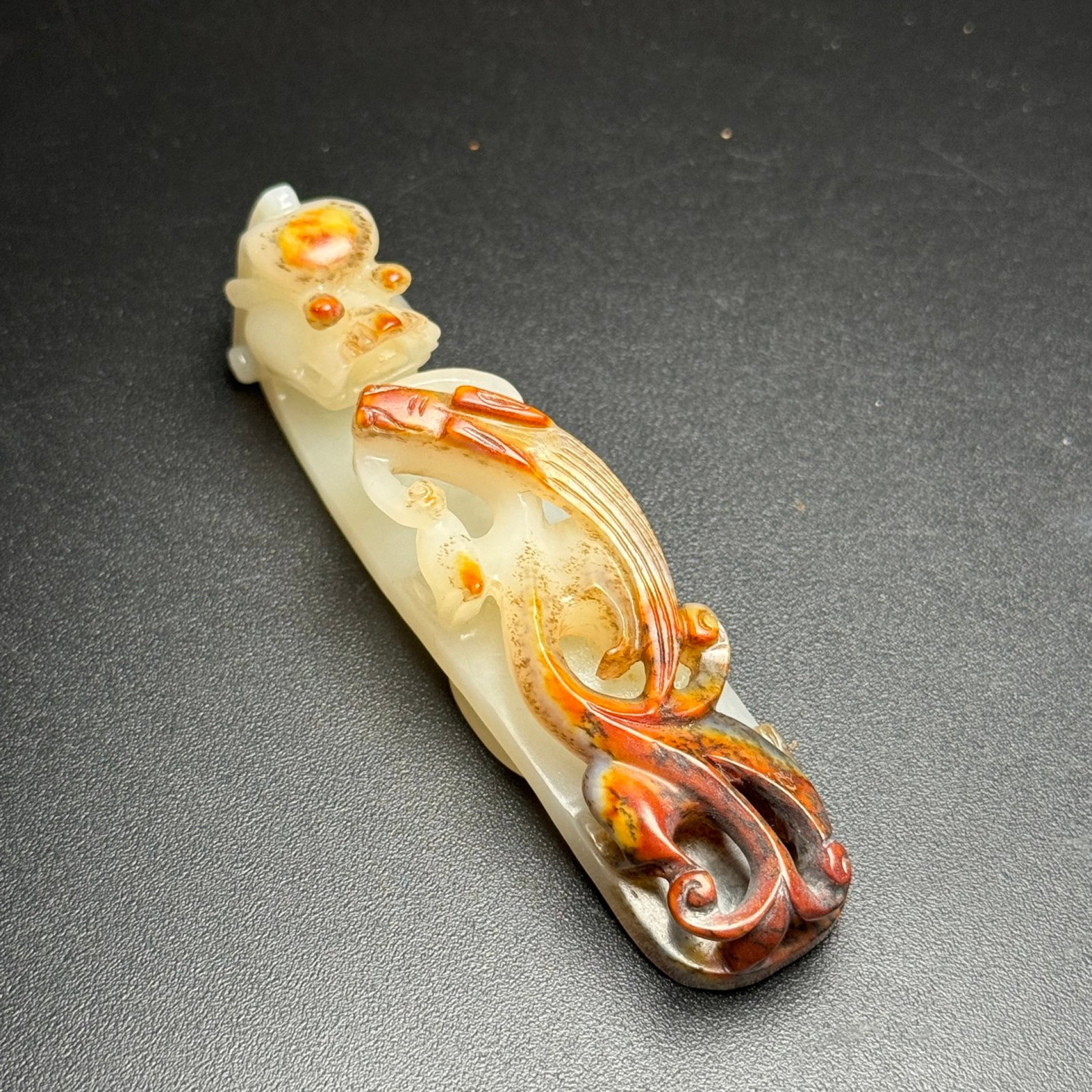 An Exquisite White Jade Dragon Hand Piece: An Exquisite White Jade Dragon Hand Piece,Qing Dynasty, China,Size:3.9inx0.9inx1in,Weight:64g 白玉龙手把件,中国清代