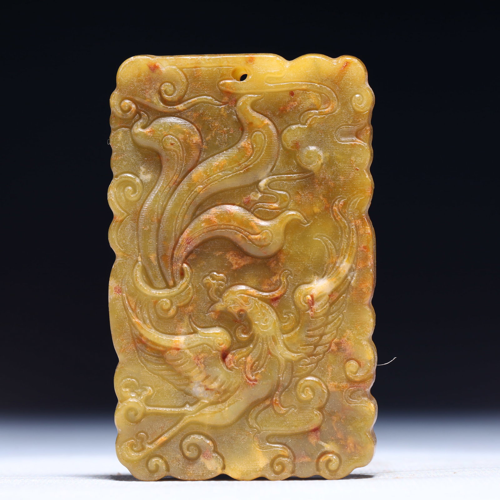 An Exquisite Archaic Jade Auspicious Cloud and Phoenix Pattern Pendant: An Exquisite Archaic Jade Auspicious Cloud and Phoenix Pattern Pendant,Ancient Time,China,Size:2inx0.3inx3.1in,Weight:80g 高古玉祥云凤纹挂件,È