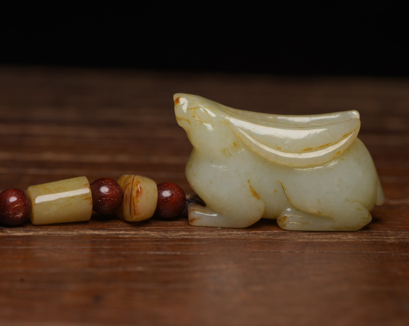 An Exquisite White Jade Rabbit Ornament: An Exquisite White Jade Rabbit Ornament,Qing Dynasty,China,Size:2inx1.2inx0.8in,Weight:51g 白玉兔子摆件,中国清代