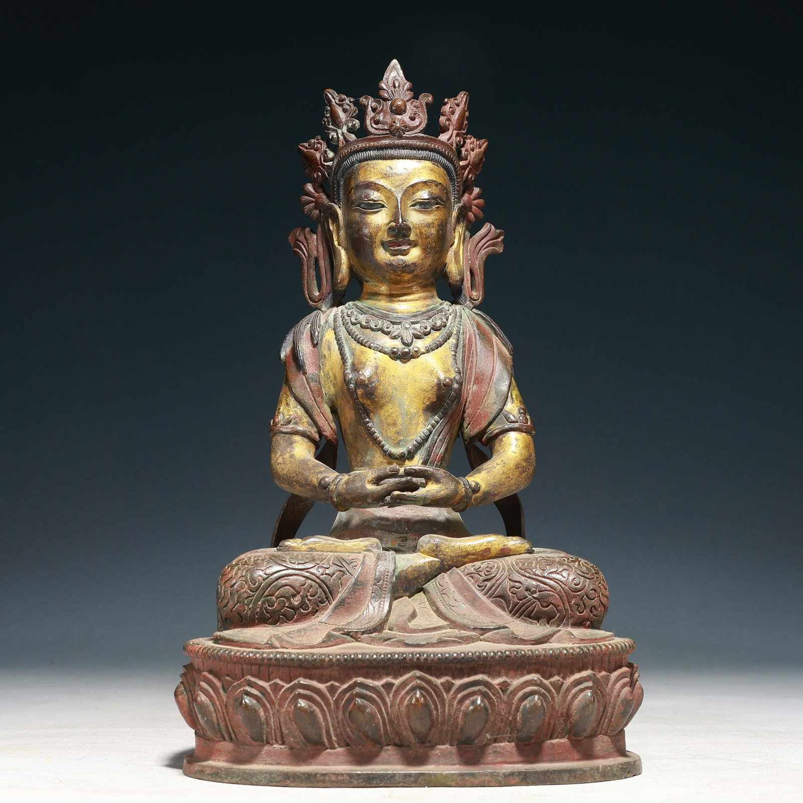 A Solemn Gilt Bronze Buddha Statue: A Solemn Gilt Bronze Buddha Statue,Qing Dynasty,China,Size:7.9inx5.5inx13.4in,Weight:5100g 铜鎏金佛像,中国清代