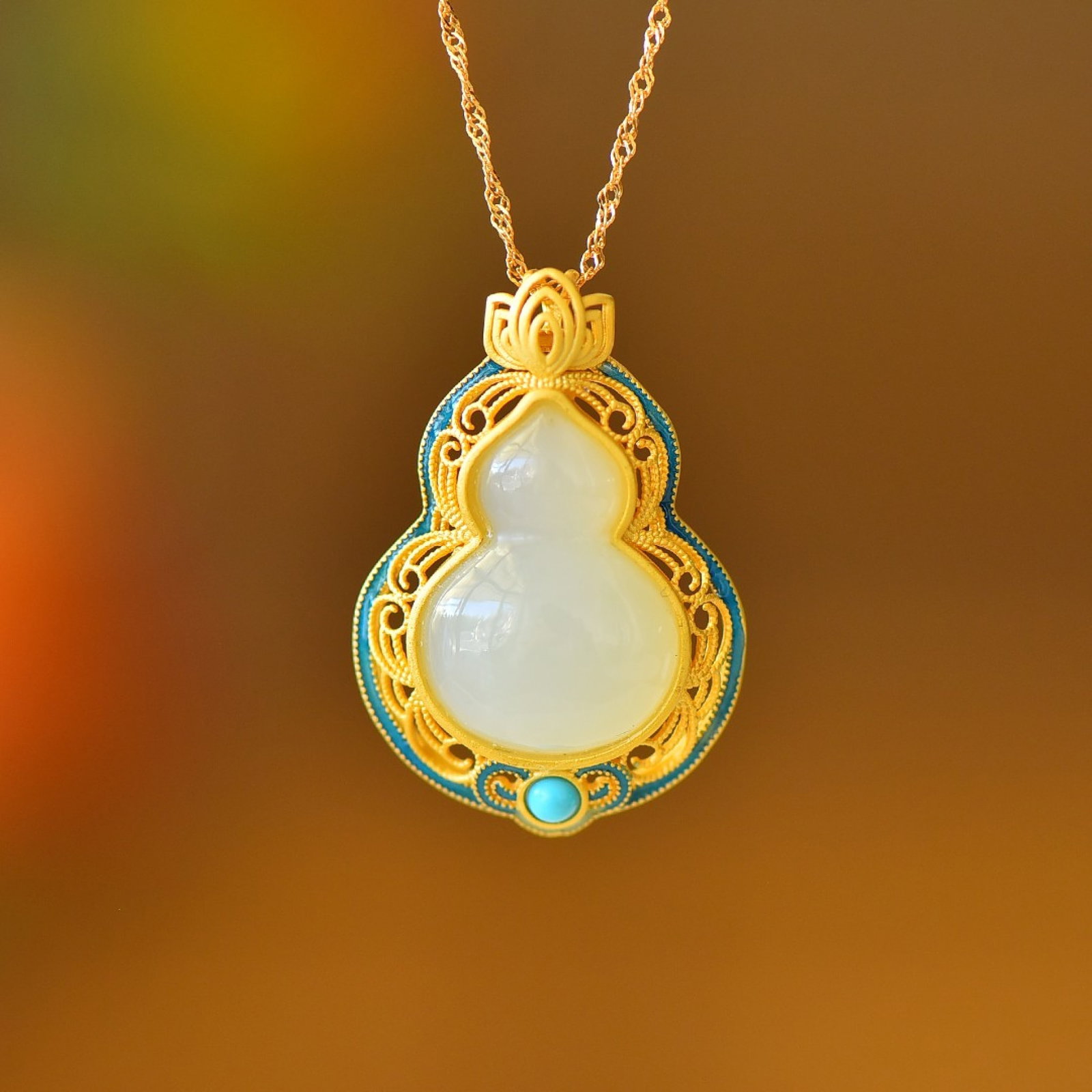 An Exquisite Sterling Silver-Gold Plated Inlaid White Jade Pendant: An Exquisite Sterling Silver-Gold Plated Inlaid White Jade Pendant 纯银镀金镶白玉吊坠