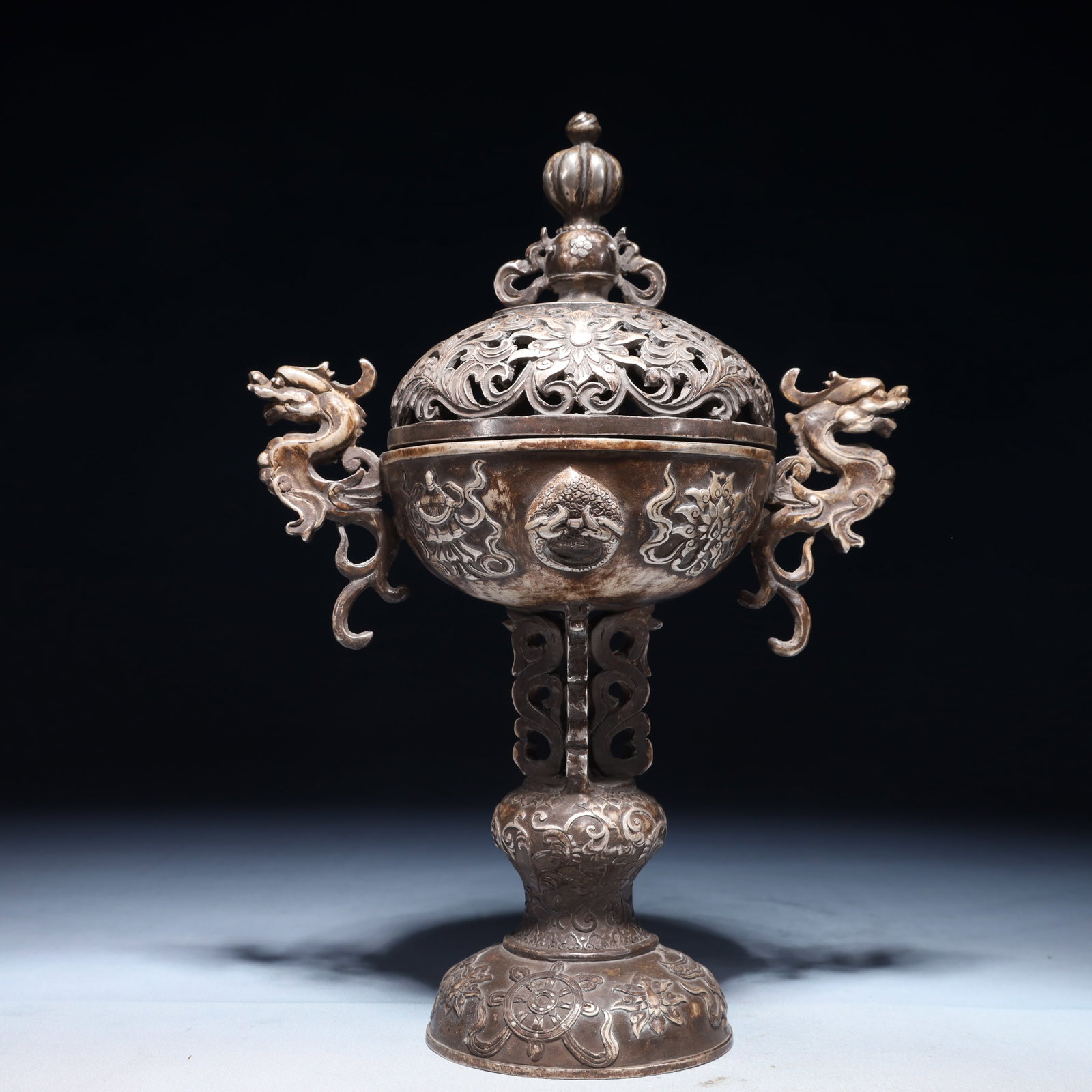An Exquisite Silver-plated Bronze Lotus Pattern Double-Ears Censer: An Exquisite Silver-plated Bronze Lotus Pattern Double-Ears Censer,Qing Dynasty,China,Size:8.3inx4.9inx11.4in,Weight:1650g 铜镀银缠枝莲纹双耳Ɖ
