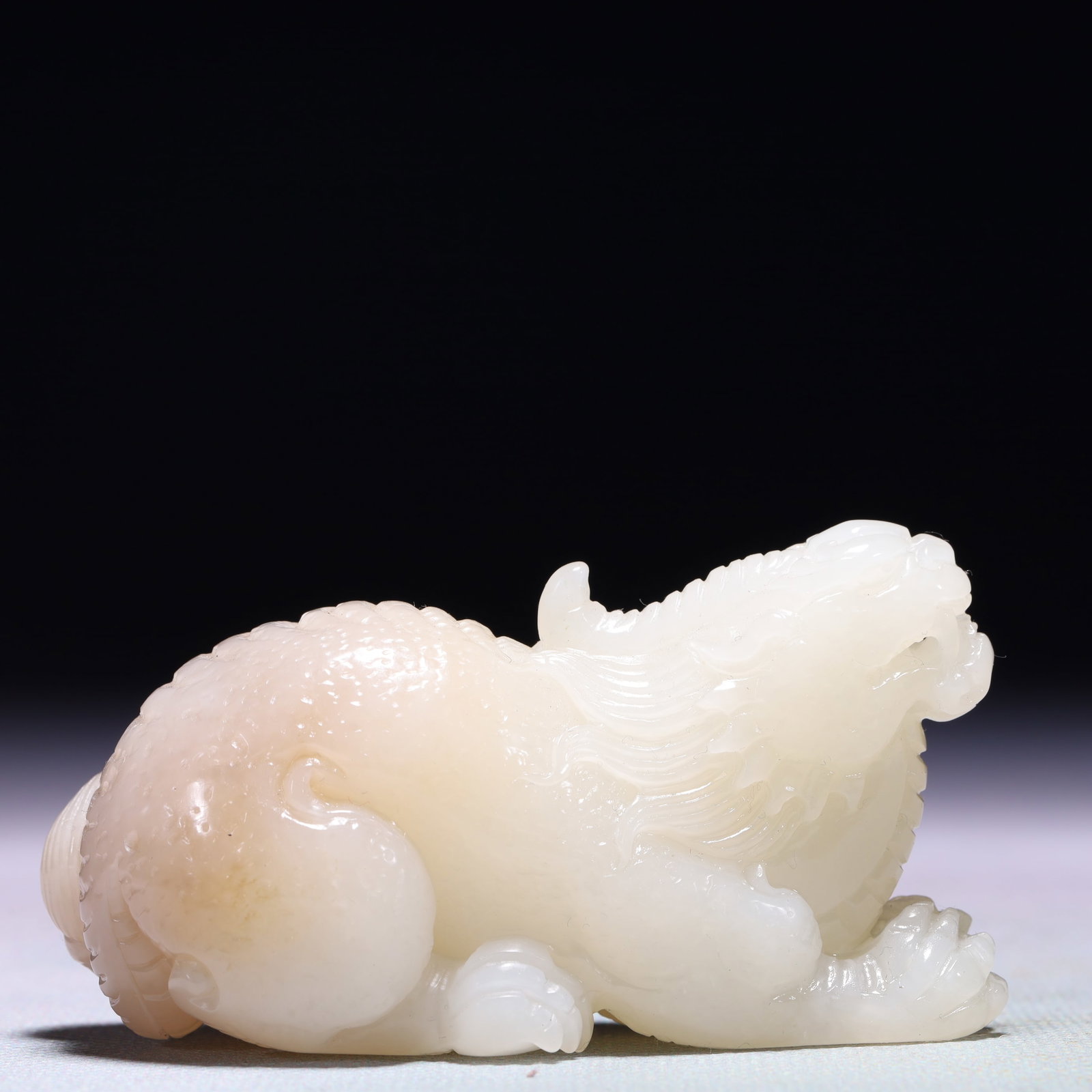 An Exquisite White Jade Unicorn Ornament: An Exquisite White Jade Unicorn Ornament,Qing Dynasty,China,Size:3.1inx1.4inx1.8in,Weight:166g 白玉独角兽摆件,中国清代