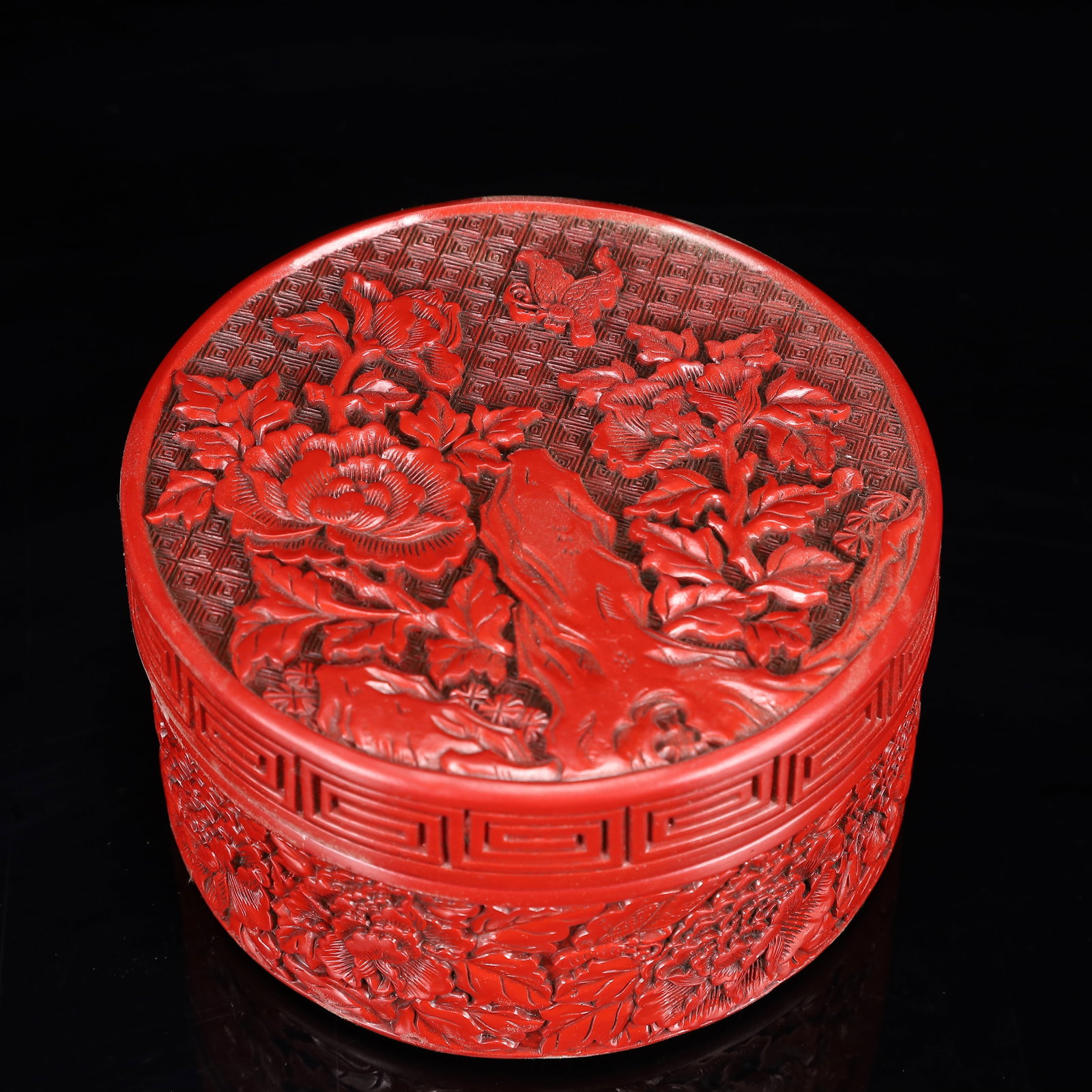 An Exquisite Carved Red Lacquer Flower and Butterfly Pattern Box with Cover: An Exquisite Carved Red Lacquer Flower and Butterfly Pattern Box with Cover,Qing Dynasty, China,Qianlong Four-character Mark,Size:5.5inx3.1in,Weight:750g 剔红漆器花ࡔ