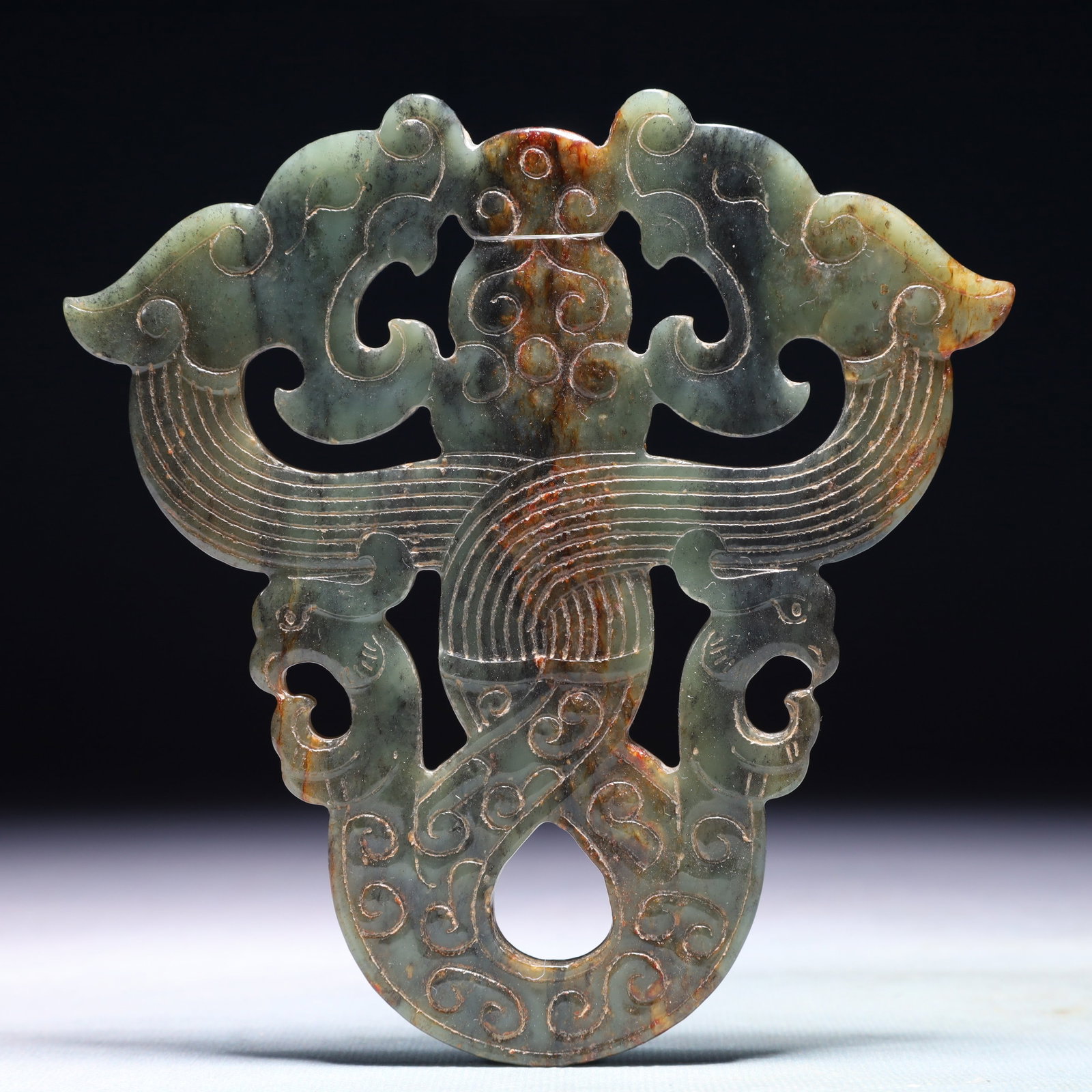 An Exquisite Green Jade Dragon Pattern Pendant: An Exquisite Green Jade Dragon Pattern Pendant,Qing Dynasty,China,Size:5.1inx5.9in,Weight:176.9g 青玉龙纹挂件,中国清代