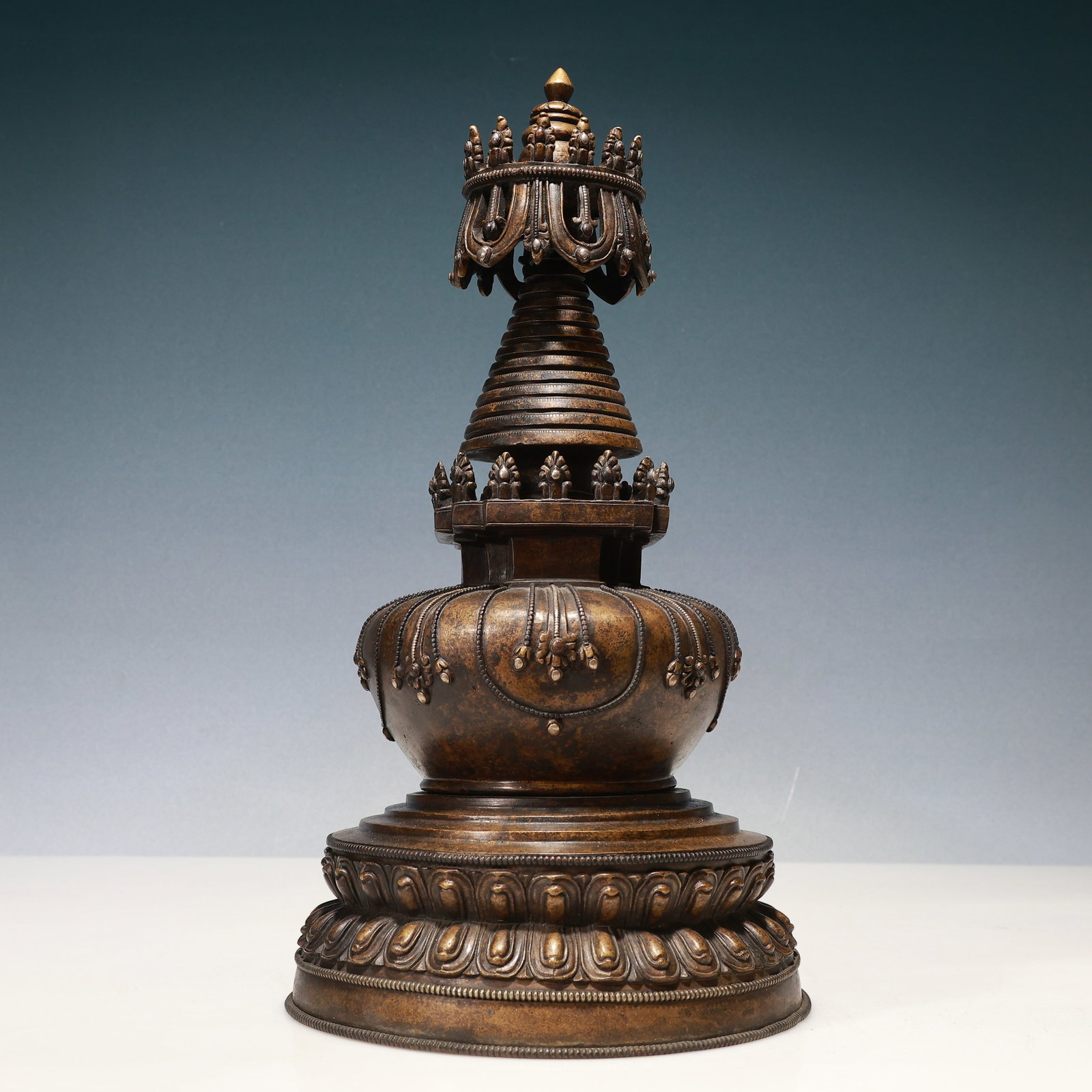 A Solemn Bronze Inlaid Silver Pagoda: A Solemn Bronze Inlaid Silver Pagoda,Qing Dynasty, China,Size:9.4inx18.9in,Weight:8950g 铜嵌银佛塔,中国清代