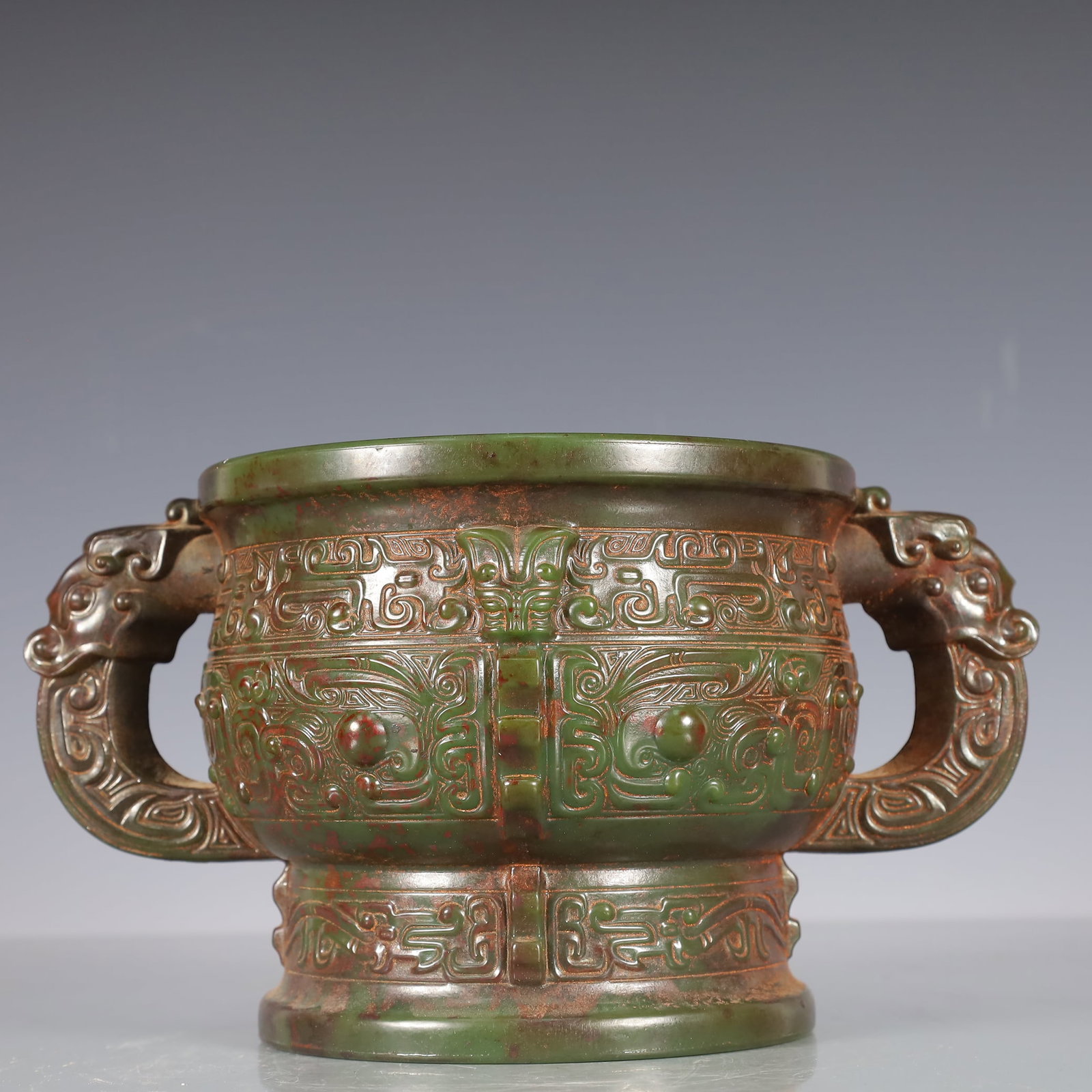 A Exquisite Jasper Beast-Face Pattern Double-Ears Censer: A Exquisite Jasper Beast-Face Pattern Double-Ears Censer Qing Dynasty, China Size:9.4inx6.1inx5.1in Weight:2050g碧玉兽面纹双耳香炉 中国