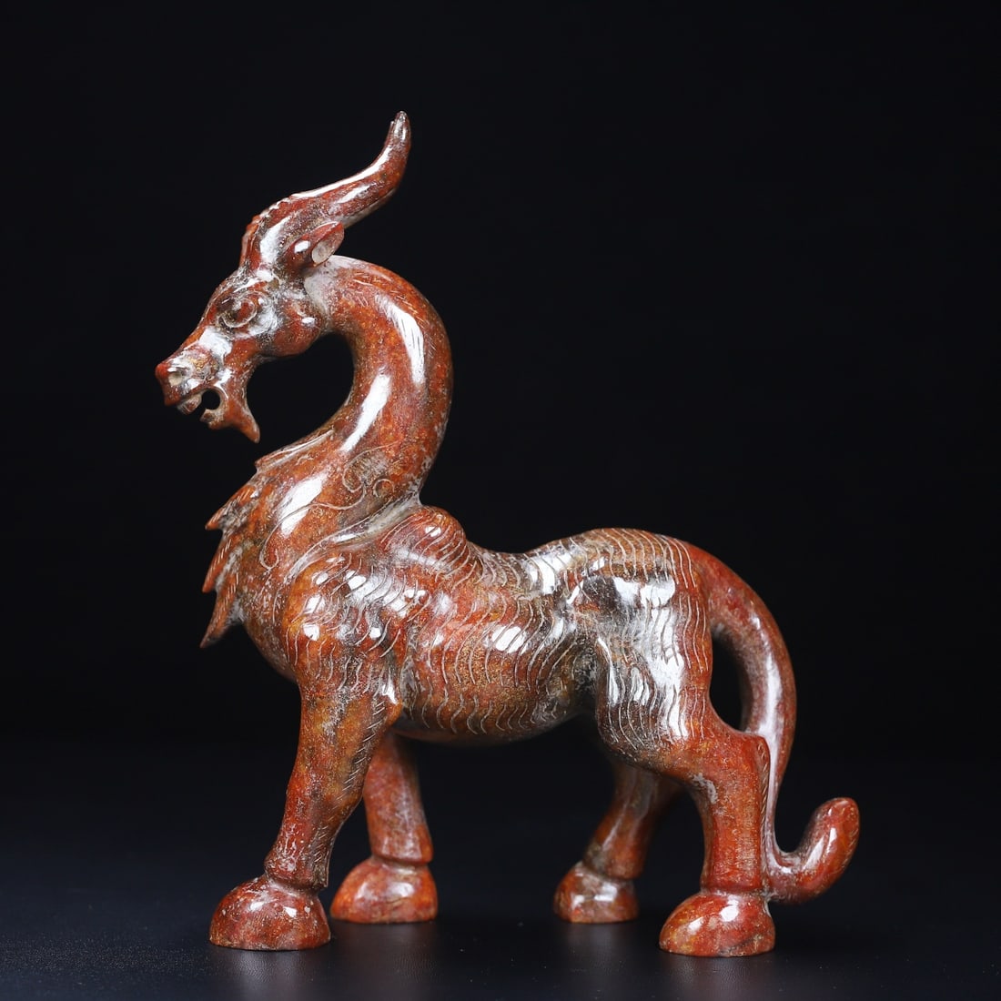 An Exquisite White Jade Auspicious Beast Ornament: An Exquisite White Jade Auspicious Beast Ornament,Qing Dynasty,China,Size:6.8inx3.2inx8.1in,Weight:1152g白玉瑞兽摆件,中国清代,Size:17.2cmx8.