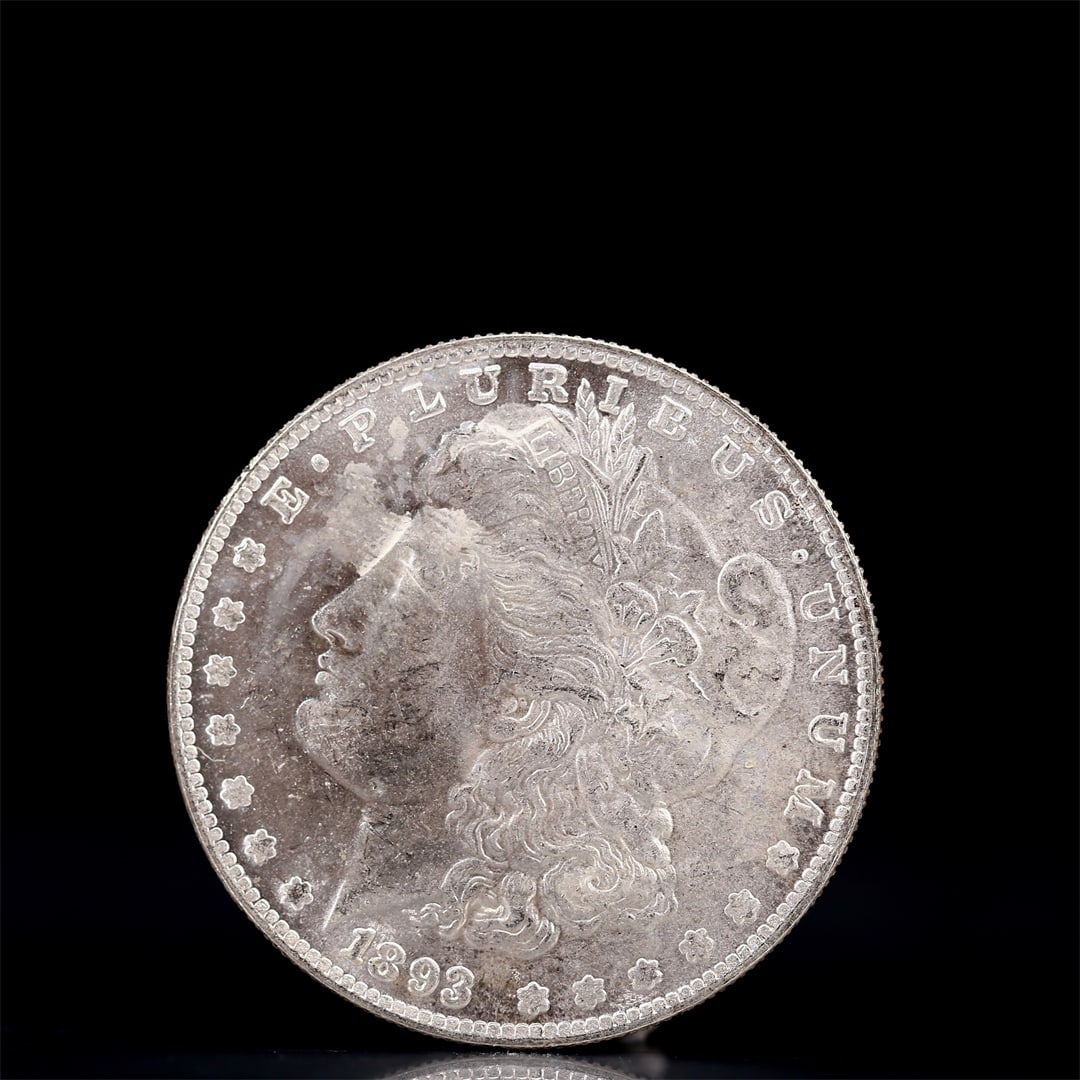 USA Morgan Dollar 1893 Coin: Obv: profile bust with date below and E PLURIBUS UNUM legend and stars around. Rev: eagle with In God we trust above within wreath with UNITED STATES OF AMERICA ONE DOLLAR legend. IN GOD WE TRUST /