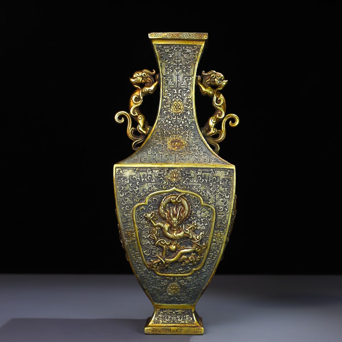 A Rare Gilt Bronze Lotus and Dragon Pattern Dragon-Ears Vase: A Rare Gilt Bronze Lotus and Dragon Pattern Dragon-Ears Vase,Tang Dynasty,China,Zhenguan Four-character