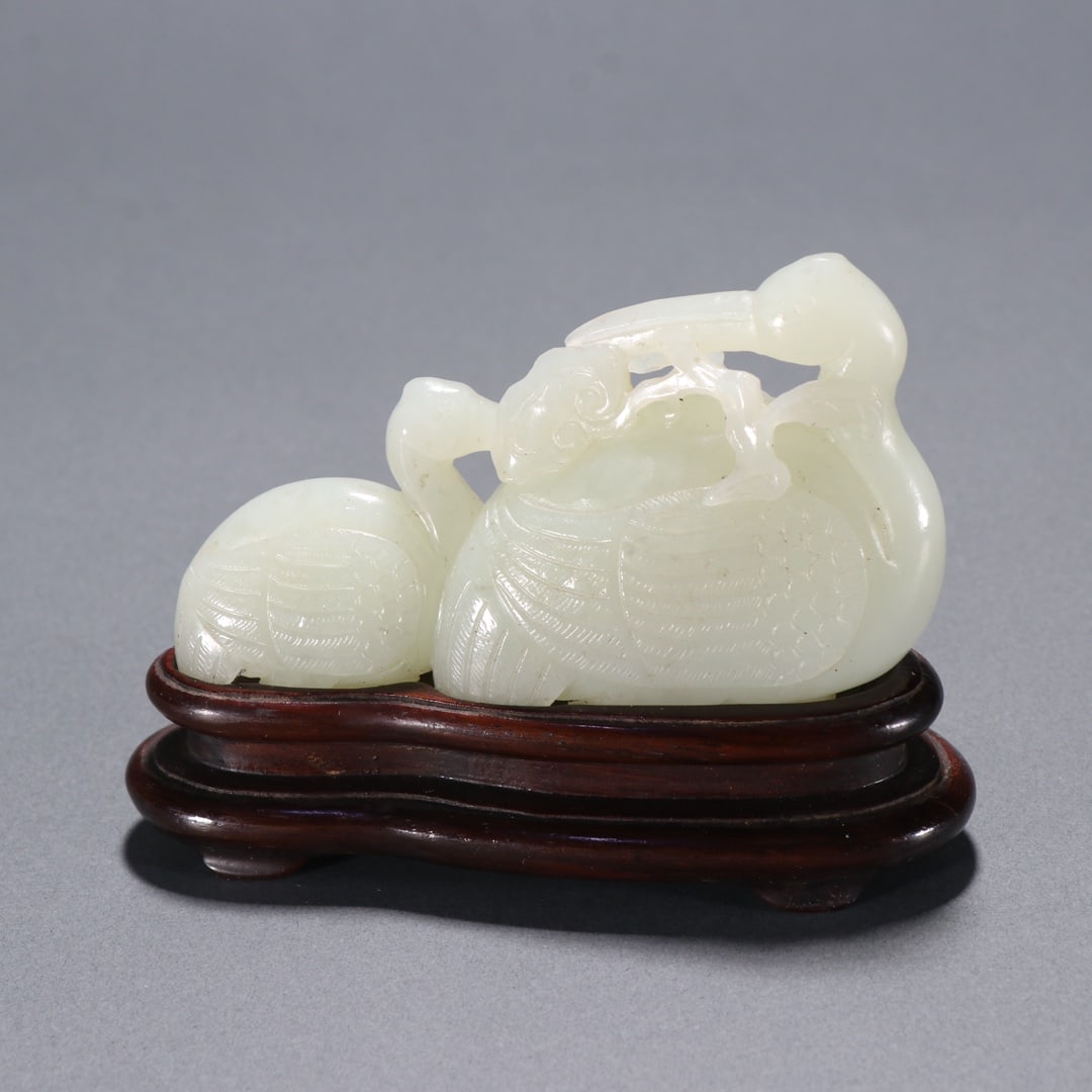 An Exquisite White Jade Duck Ornament: An Exquisite White Jade Duck Ornament,Qing Dynasty,China,Size:1.9inx3.4in,Weight:102g白玉鸭摆件,中国清代,Size:4.85cmx8.6cm,Weight:102g