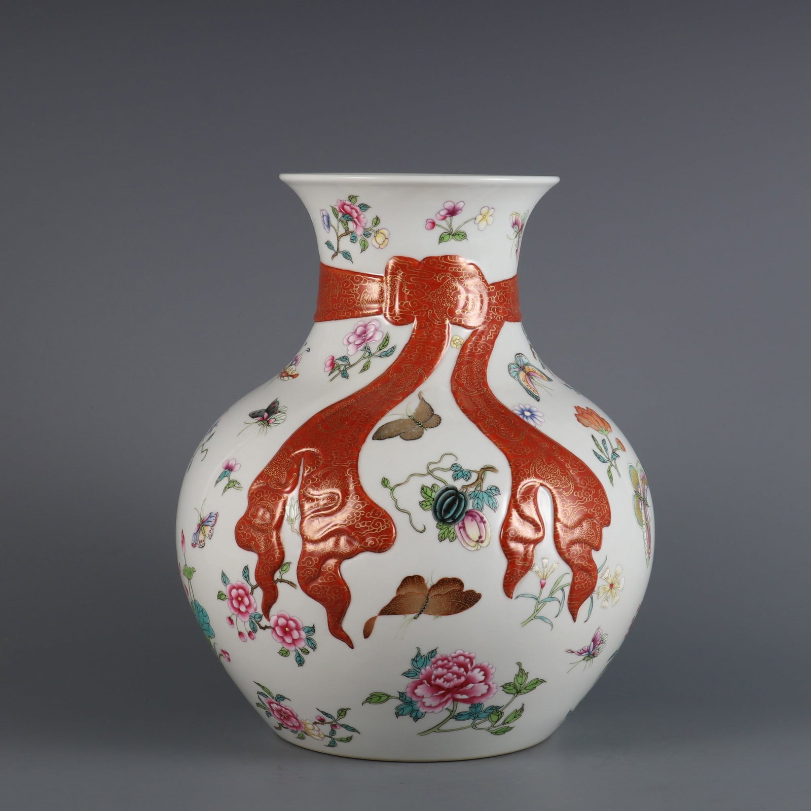 An Exquisite Famille-Rose Painted Gold Flower and Butterfly Pattern Vase: An Exquisite Famille-Rose Painted Gold Flower and Butterfly Pattern Vase Qing Dynasty, China Qianlong Six-character