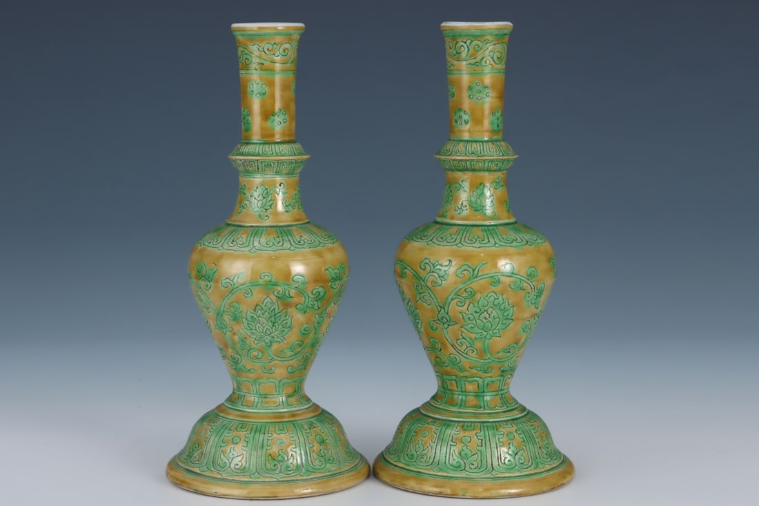 A Pair of Exquisite Green Ground Lotus Pattern Candlestick: A Pair of Exquisite Green Ground Lotus Pattern Candlestick Song Dynasty, China Size:8.8inx4in黄地绿彩缠枝纹烛台一对