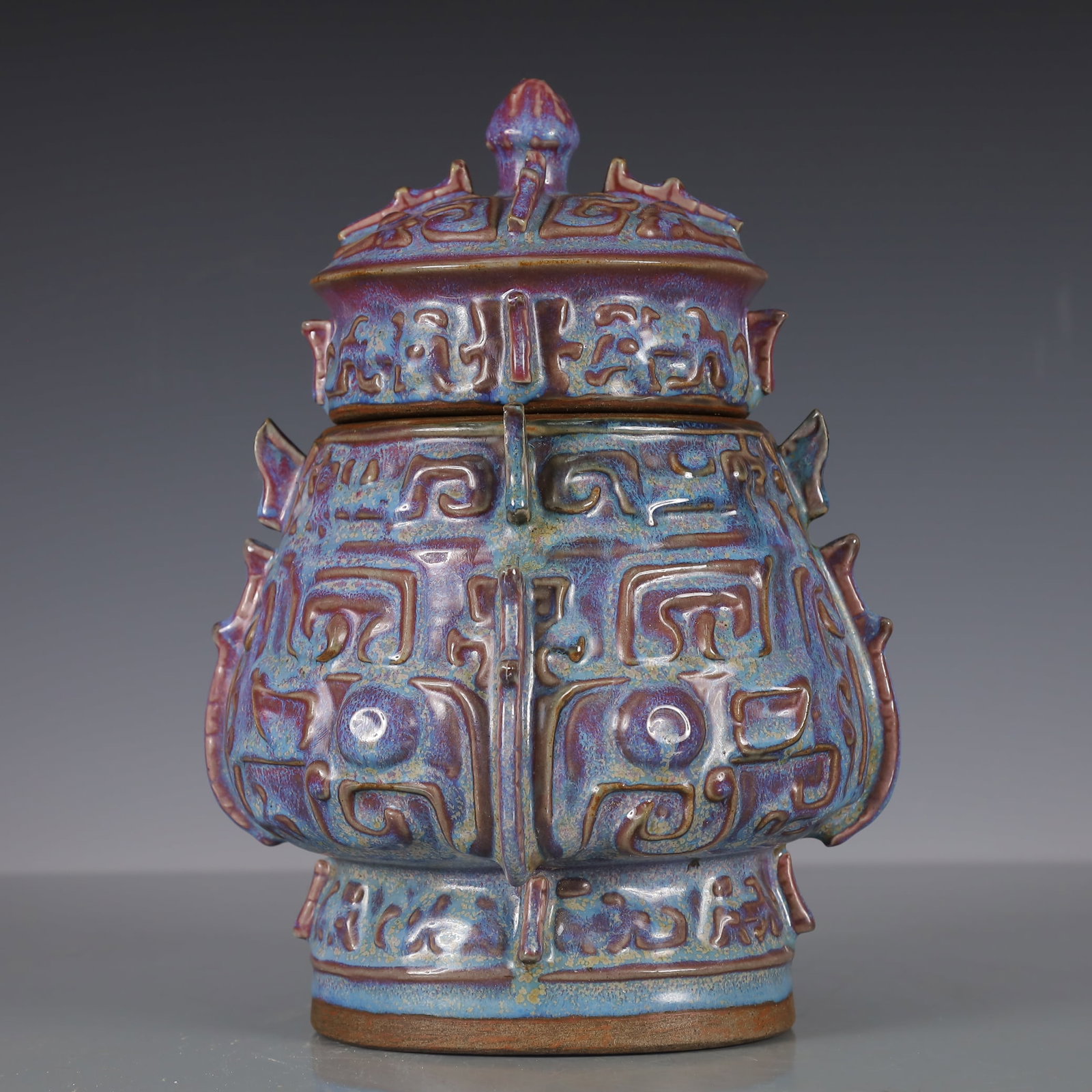 A Exquisite Jun yao Beast-Face Pattern Ewer: A Exquisite Jun yao Beast-Face Pattern Ewer Song Dynasty, China Size:7.9inx7.1inx9.1in Weight:1550g钧窑兽面纹壶 中国宋代
