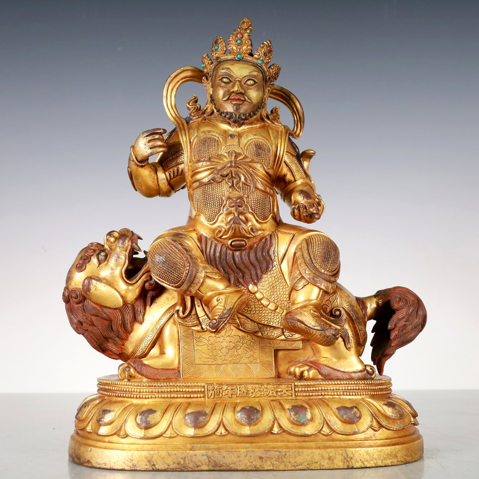 A Exquisite Gilt Bronze Statue of Mammon Buddha statue: A Exquisite Gilt Bronze Statue of Mammon Buddha statue Qing Dynasty, China Qianlong Six-character Mark Size:9.1inx5.1inx11.8in Weight:6650g铜鎏金财神佛像 