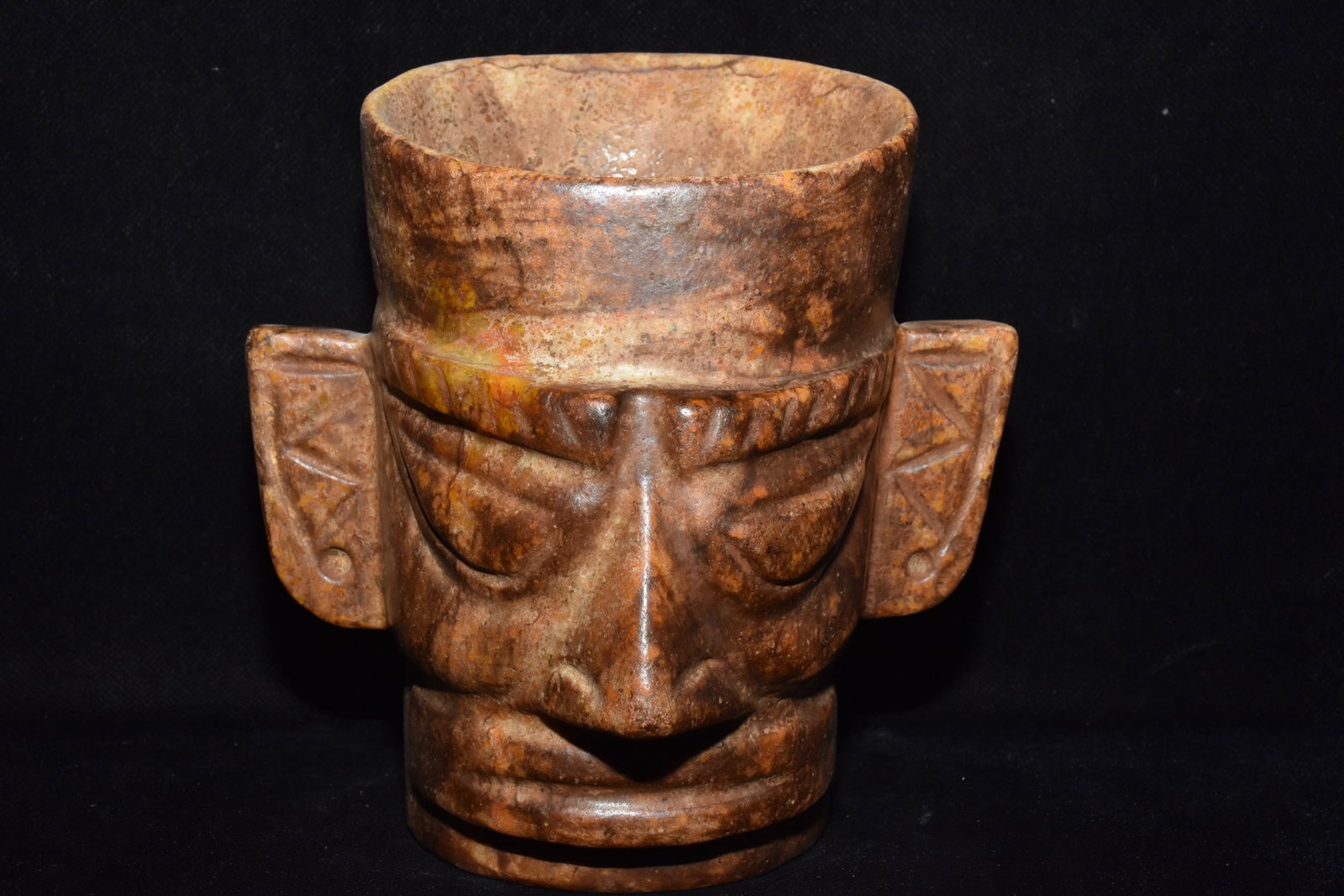 An Exquisite Hemo Jade Figure-Face Pattern Double-Ears Hat: An Exquisite Hemo Jade Figure-Face Pattern Double-Ears Hat,Hongshan Culture,Size:5.9inx6.5in,Weight:1330g河磨玉人面纹双耳帽子，红