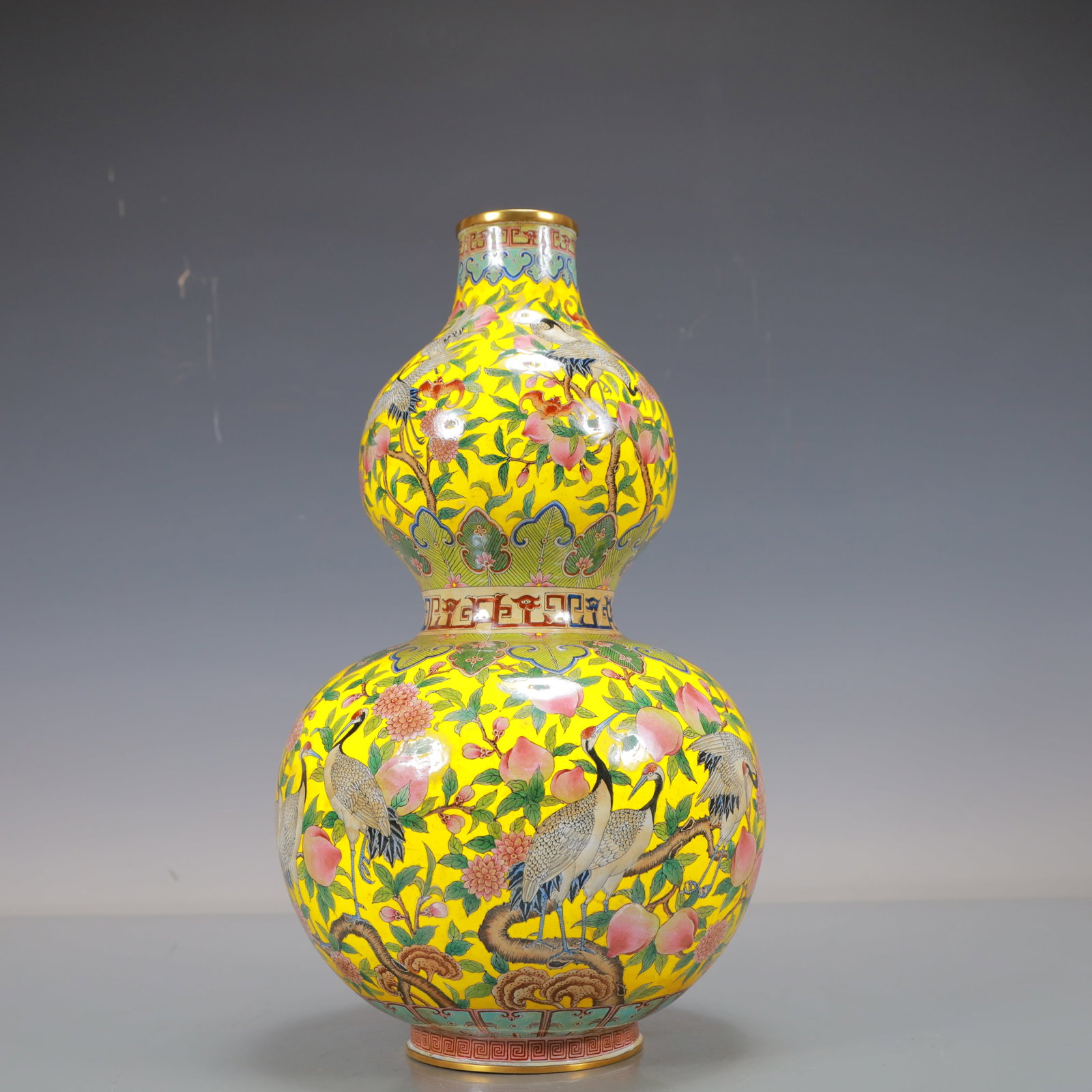 A Exquisite Coppery Enamel Flower and Fruit Pattern Crane Pattern Gourd-Shaped Vase: A Exquisite Coppery Enamel Flower and Fruit Pattern Crane Pattern Gourd-Shaped Vase Qing Dynasty, China Qianlong Four-character Mark Size:7.9inx12.6in Weight:1450g铜珐琅彩Ŏ