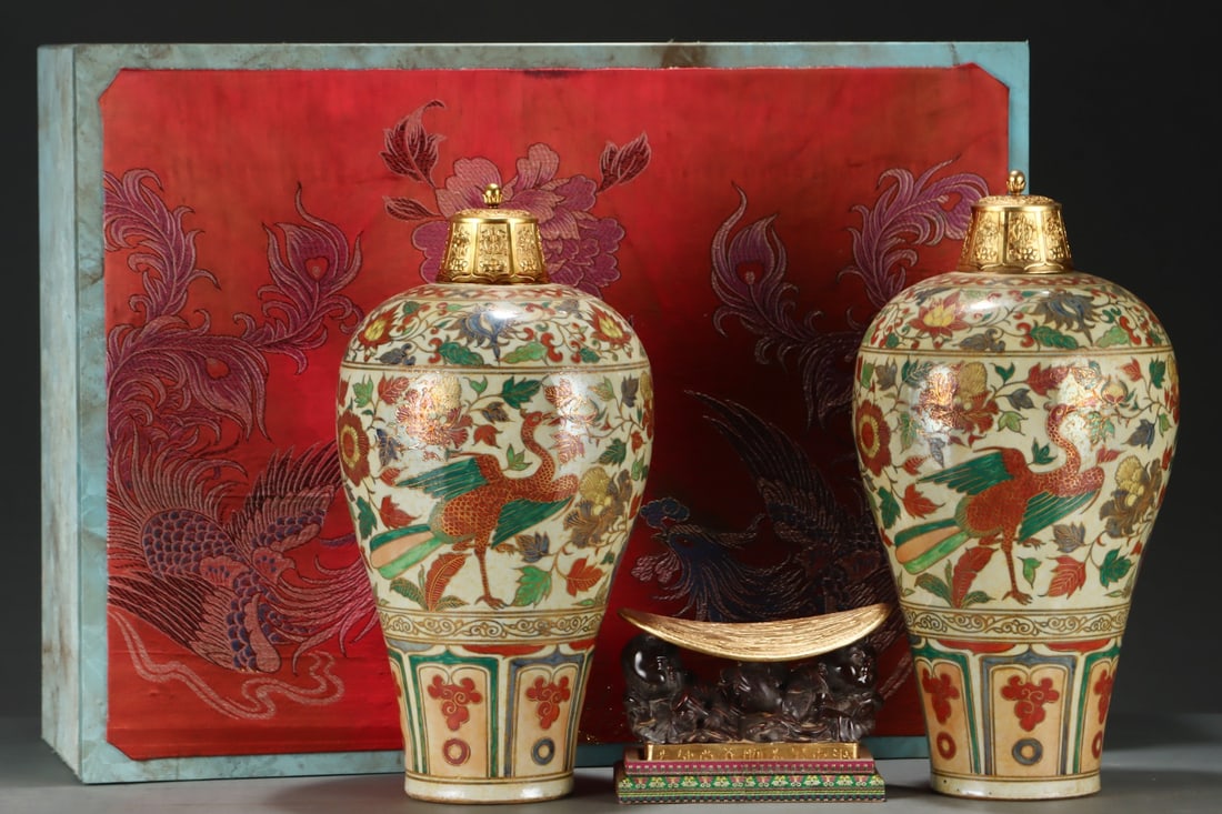 An Exquisite Wucai Painted Gold Flower and Bird Pattern Vase: An Exquisite Wucai Painted Gold Flower and Bird Pattern Vase Yuan Dynasty, China Size:19.5inx10.4in红绿彩描金孔雀花卉纹梅瓶
