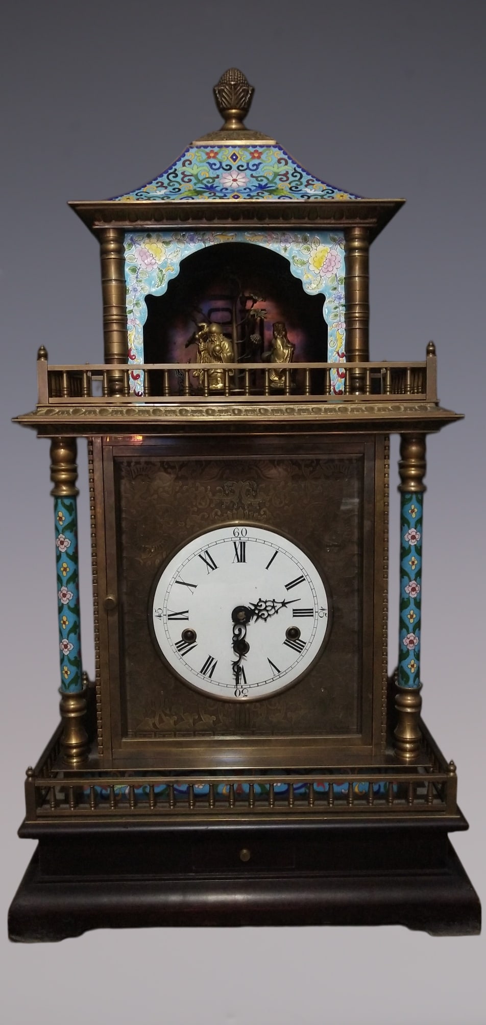 An Exquisite Bronze Lotus Pattern Clock: An Exquisite Bronze Lotus Pattern Clock Size:34.6inx18.1inx13in铜缠枝莲纹钟表 Size:88cmx46cmx33cm