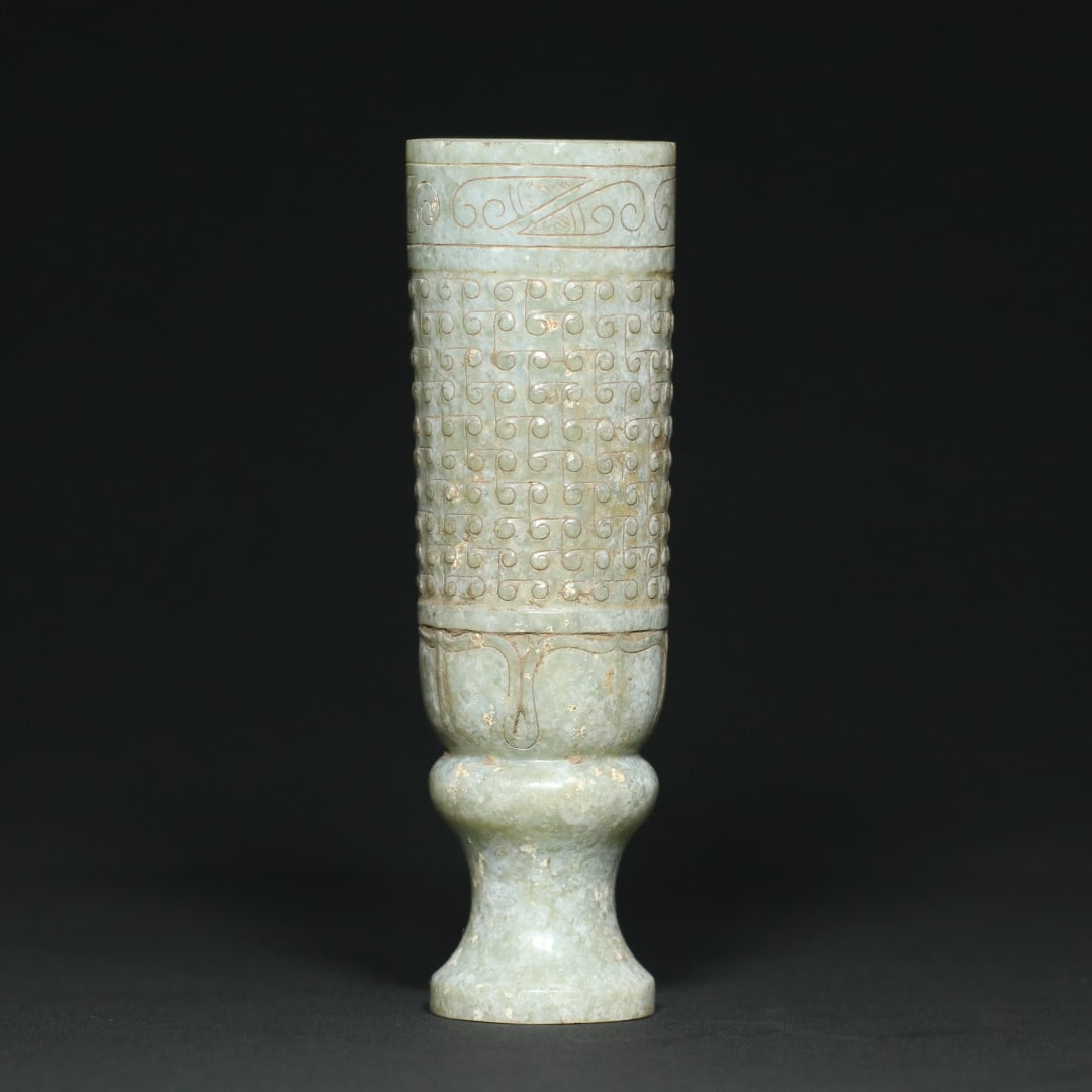 An Exquisite White Jade Ruyi Pattern Stem Cup: An Exquisite White Jade Ruyi Pattern Stem Cup,Han Dynasty,China,Size:5.2inx1.6in,Weight:179.3g白玉如意纹高足杯,中国汉代,Size:13.