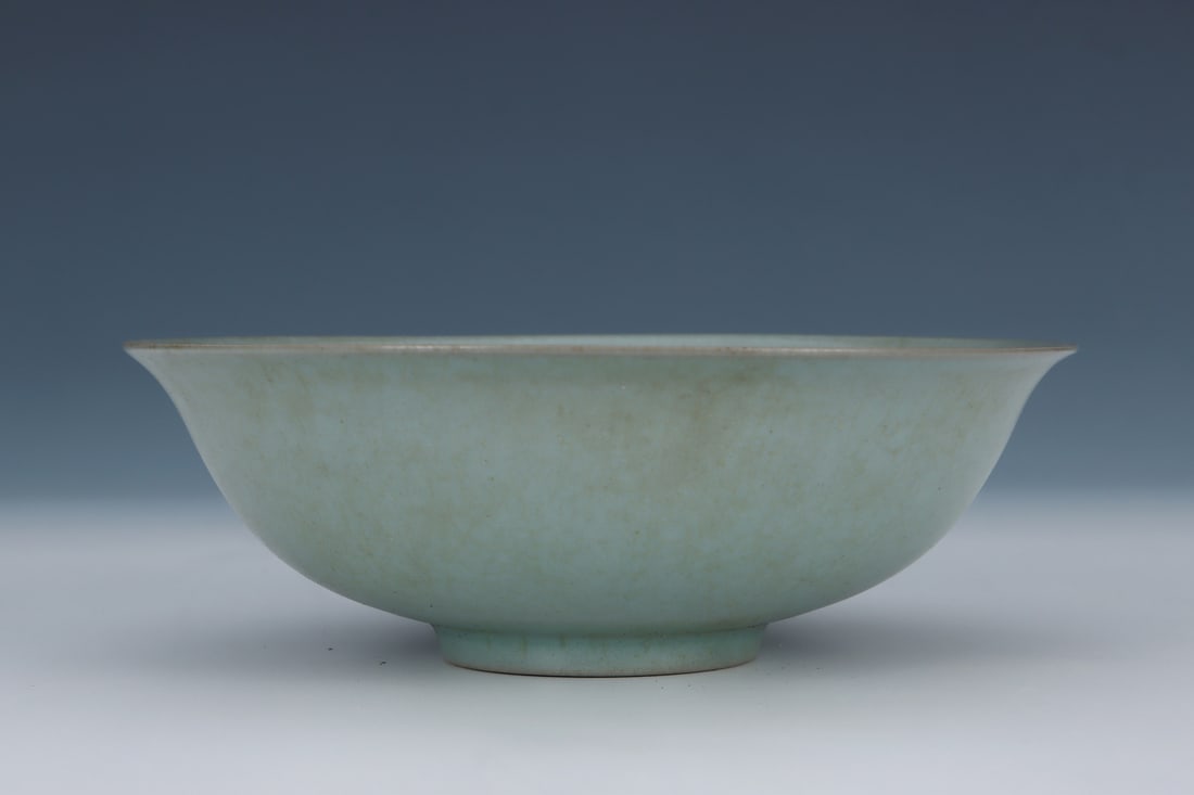 An Exquisite Ru yao Sky Blue Glazed Phoenix Pattern Bowl: An Exquisite Ru yao Sky Blue Glazed Phoenix Pattern Bowl Song Dynasty, China Size:2.5inx7.3in汝窑天青釉暗刻凤纹撇口碗 中&#