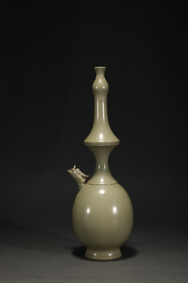 An Exquisite Yue yao Celadon Vase: An Exquisite Yue yao Celadon Vase Tang Dynasty, China Size:14inx4.3in越窑秘色青磁净瓶 中国唐代 Size:35.5cmx11cm