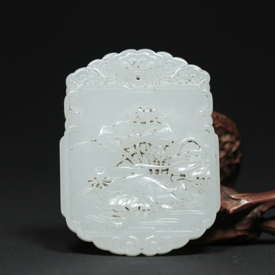 An Exquisite White Jade Lotus and Crane Pattern Pendant: An Exquisite White Jade Lotus and Crane Pattern Pendant,Qing Dynasty,China,Size:2.2inx1.7inx0.3in,Weight:35.8g白玉莲花鹤纹挂件,中国清&