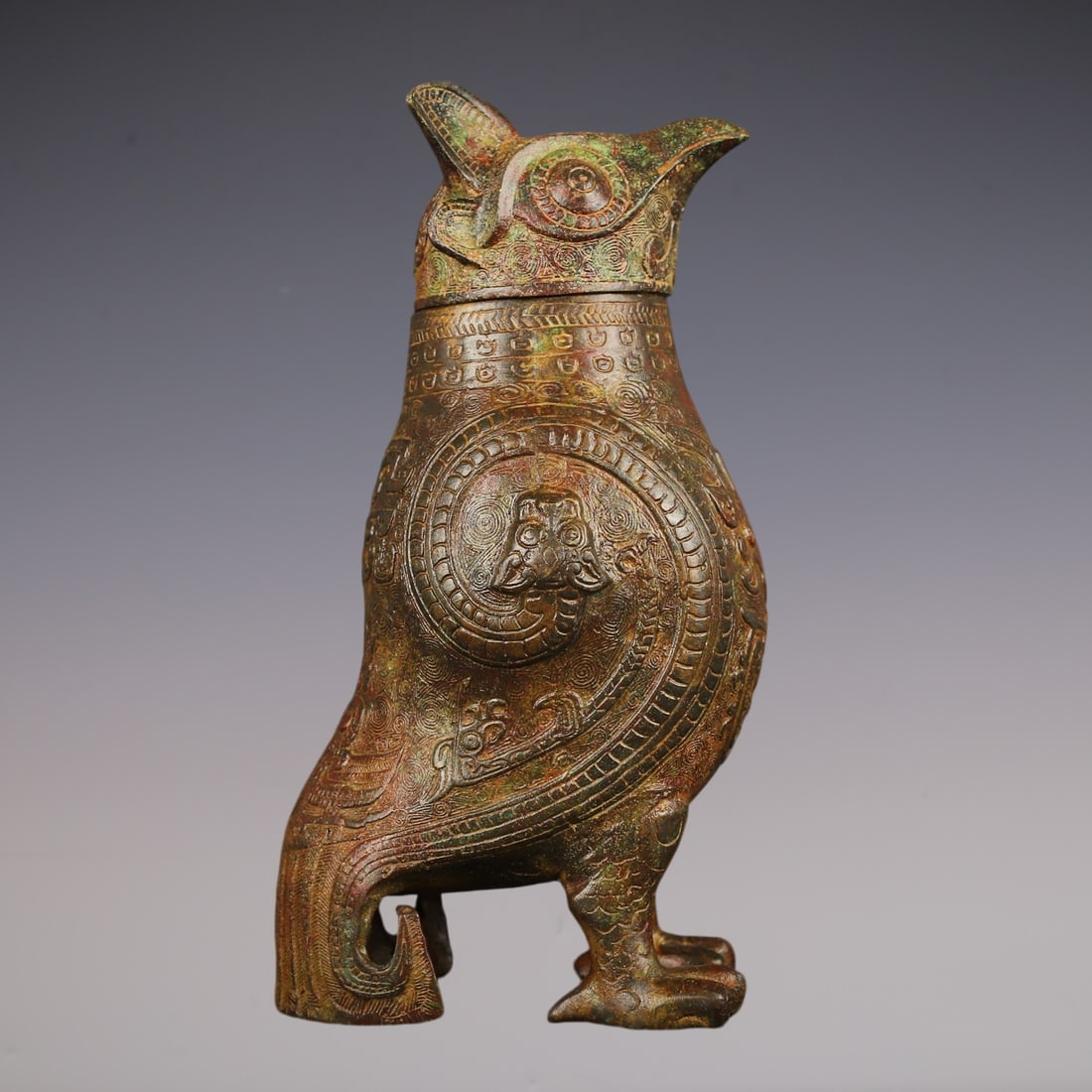 An Archaic Bronze Beast-Face and Chi-Dragon Pattern Bird-Shaped Vase: An Archaic Bronze Beast-Face and Chi-Dragon Pattern Bird-Shaped Vase,W.Zhou ,China,Size:5.9inx11in,Weight:1750g青铜兽面螭龙纹鸟形瓶,中
