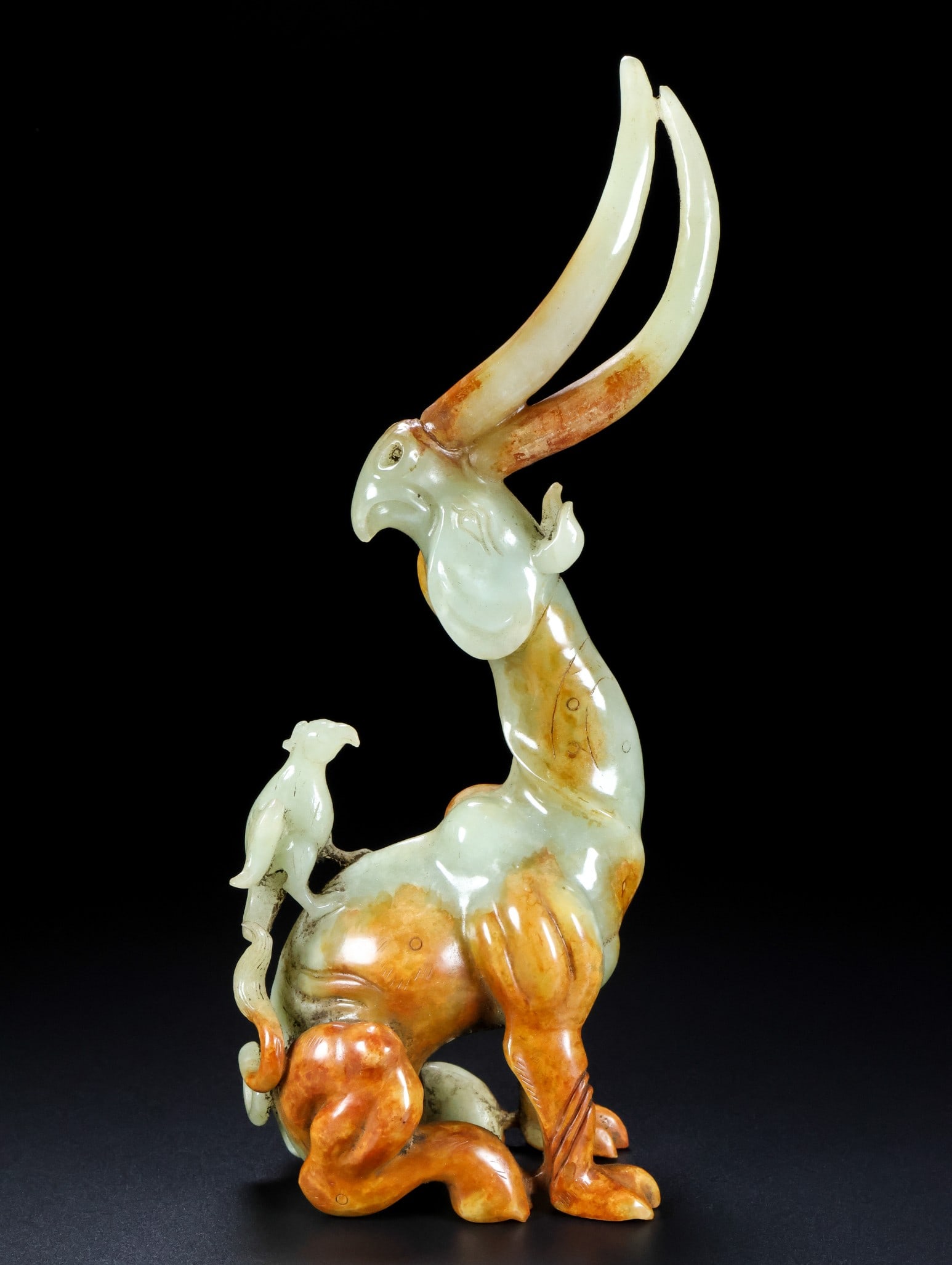 An Exquisite White Jade Auspicious Beast Ornament: An Exquisite White Jade Auspicious Beast Ornament,Qing Dynasty,China,Size:10.2inx5.5inx3.1in,Weight:834g白玉瑞兽摆件,中国清代,Size:26cmx14cm
