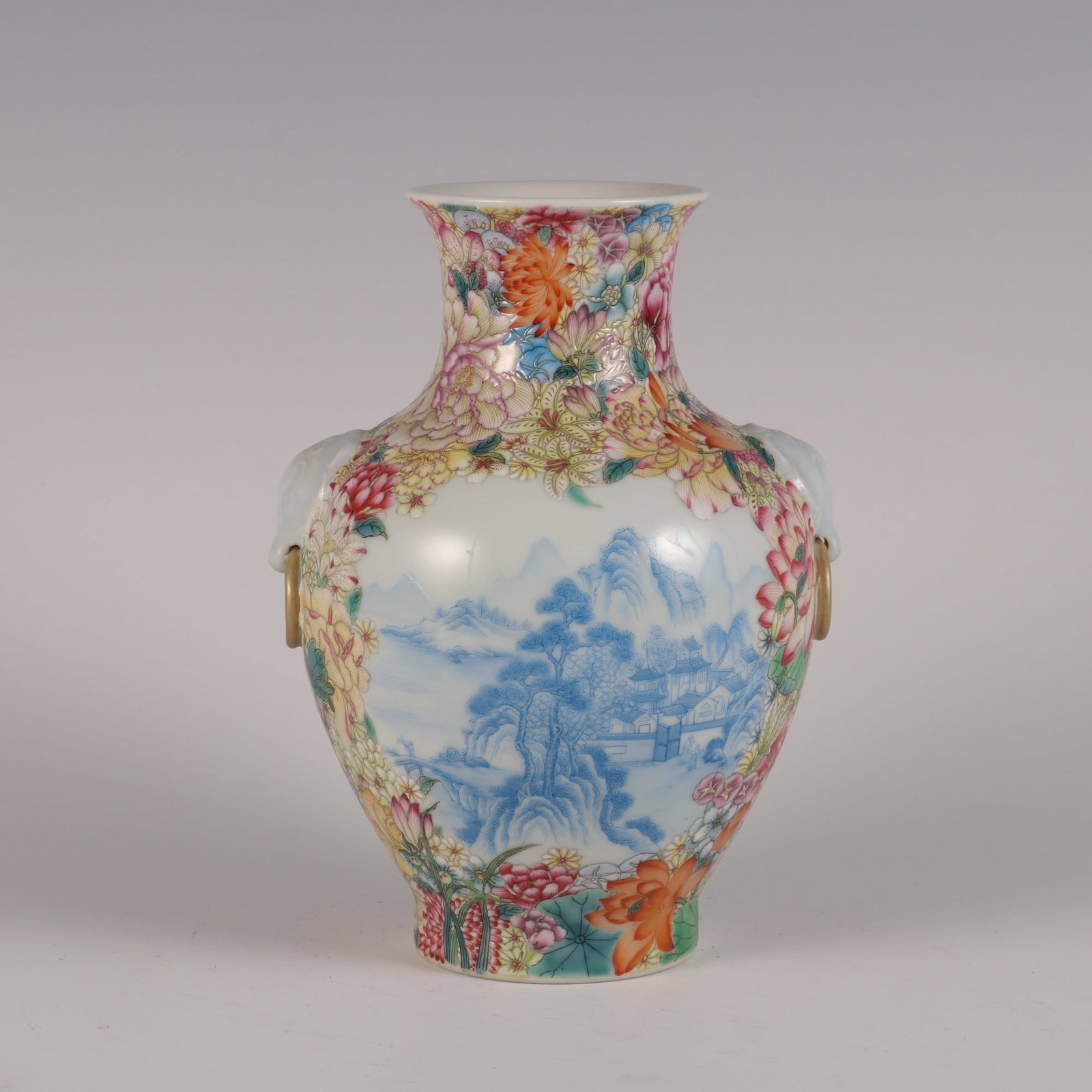 An Exquisite Enamel Flower Pattern Landscape Pattern Double-Ears Vase: An Exquisite Enamel Flower Pattern Landscape Pattern Double-Ears Vase Qing Dynasty, China Qianlong Six-character MarkSize:7.3inx5.1in珐琅彩花卉纹山水