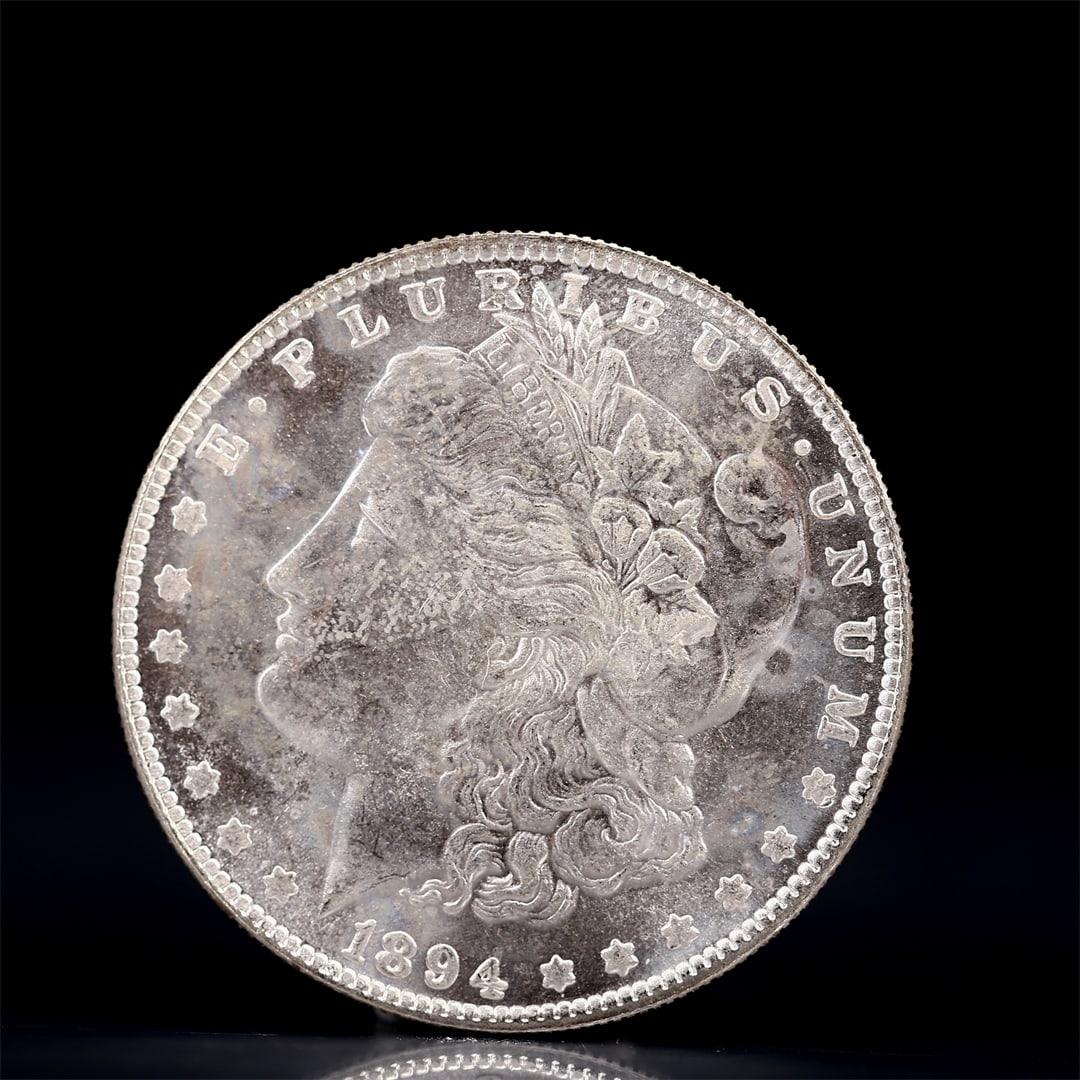 USA Morgan Dollar 1894 Coin: Obv: profile bust with date below and E PLURIBUS UNUM legend and stars around. Rev: eagle with In God we trust above within wreath with UNITED STATES OF AMERICA ONE DOLLAR legend. IN GOD WE TRUST / LI