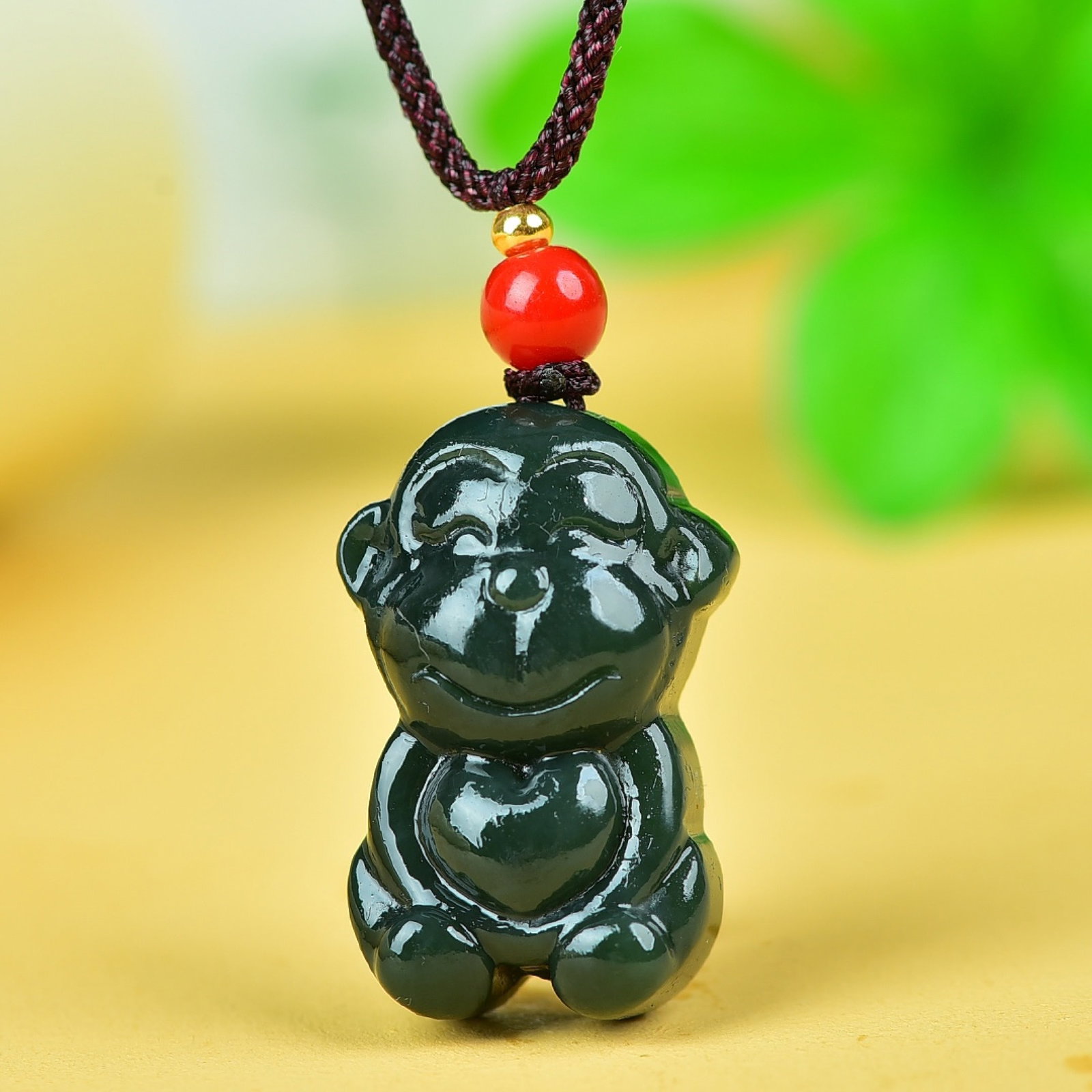 An Exquisite Jasper Monkey Pattern Pendant: An Exquisite Jasper Monkey Pattern Pendant,Size:19mmx30mm 碧玉猴纹挂件