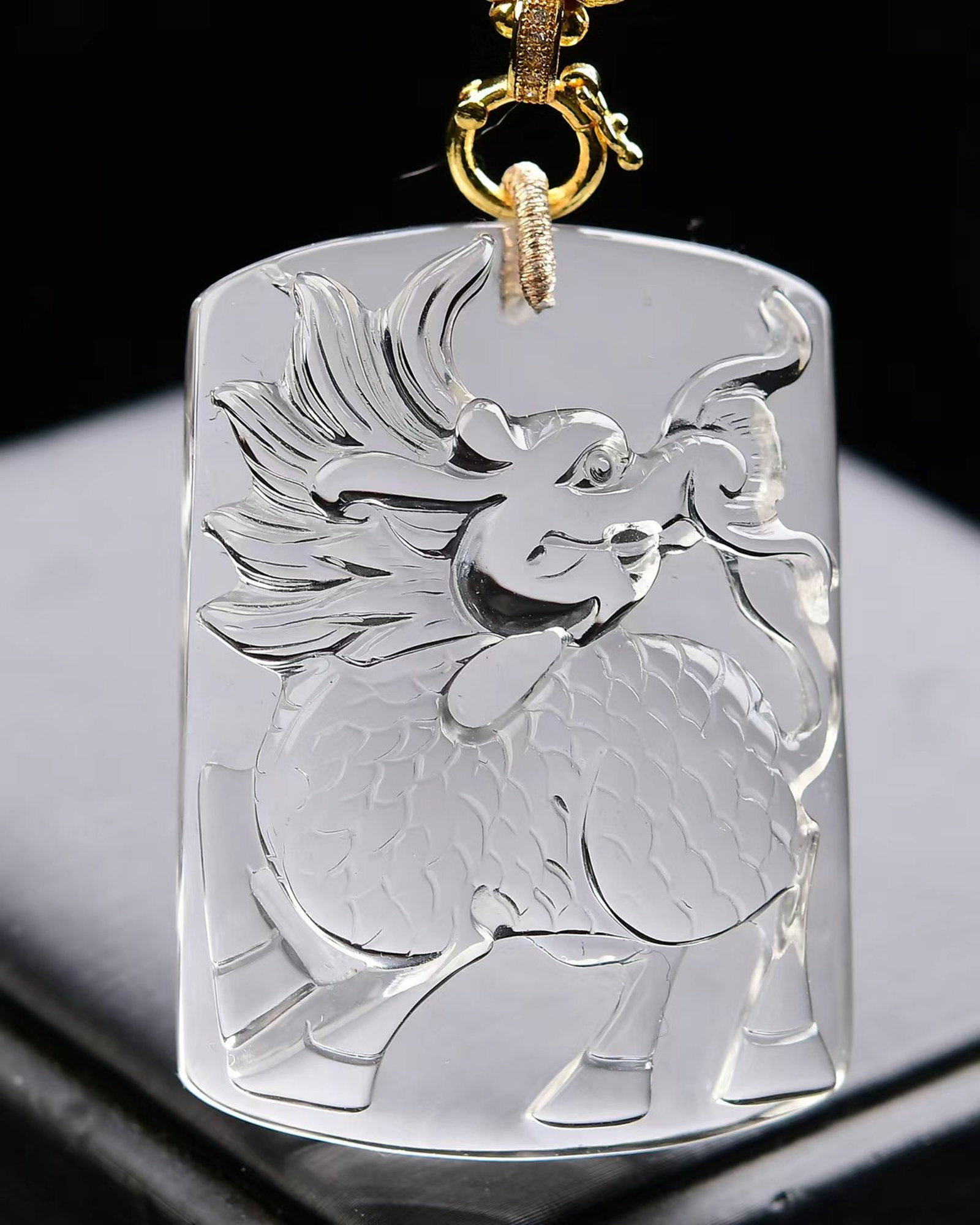 An Exquisite Crystal Kylin Pattern Pendant: An Exquisite Crystal Kylin Pattern Pendant,Size:53mmx39mmx16mm,Weight:89.7g 水晶麒麟纹吊坠