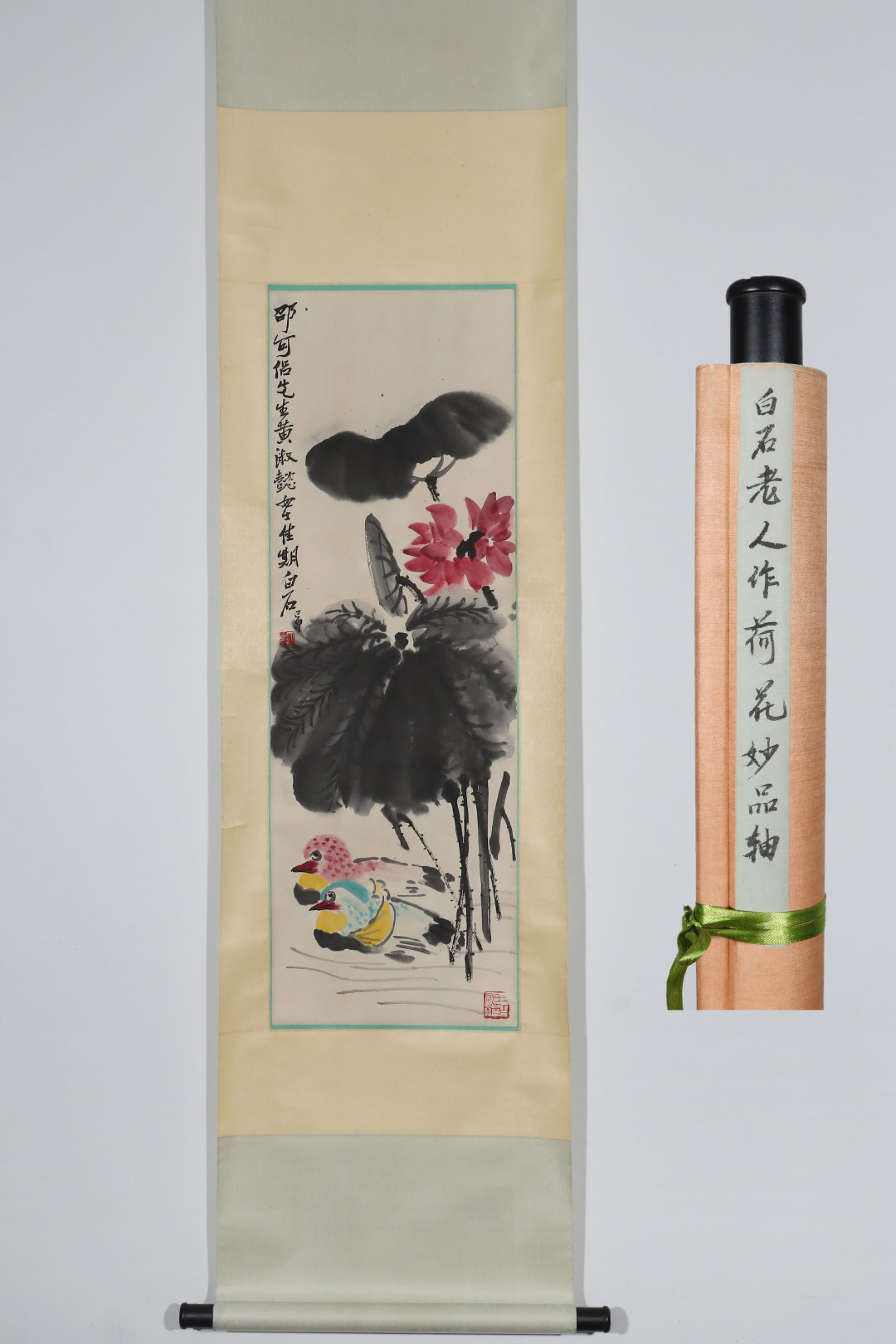 A Chinese Vertical Scroll Ink Painting of Flower and Mandarin Duck on Paper: A Chinese Vertical Scroll Ink Painting of Flower and Mandarin Duck on Paper,Qi Baishi,Size:40.6inx13.6in 一幅中国水墨花卉鸳鸯画立