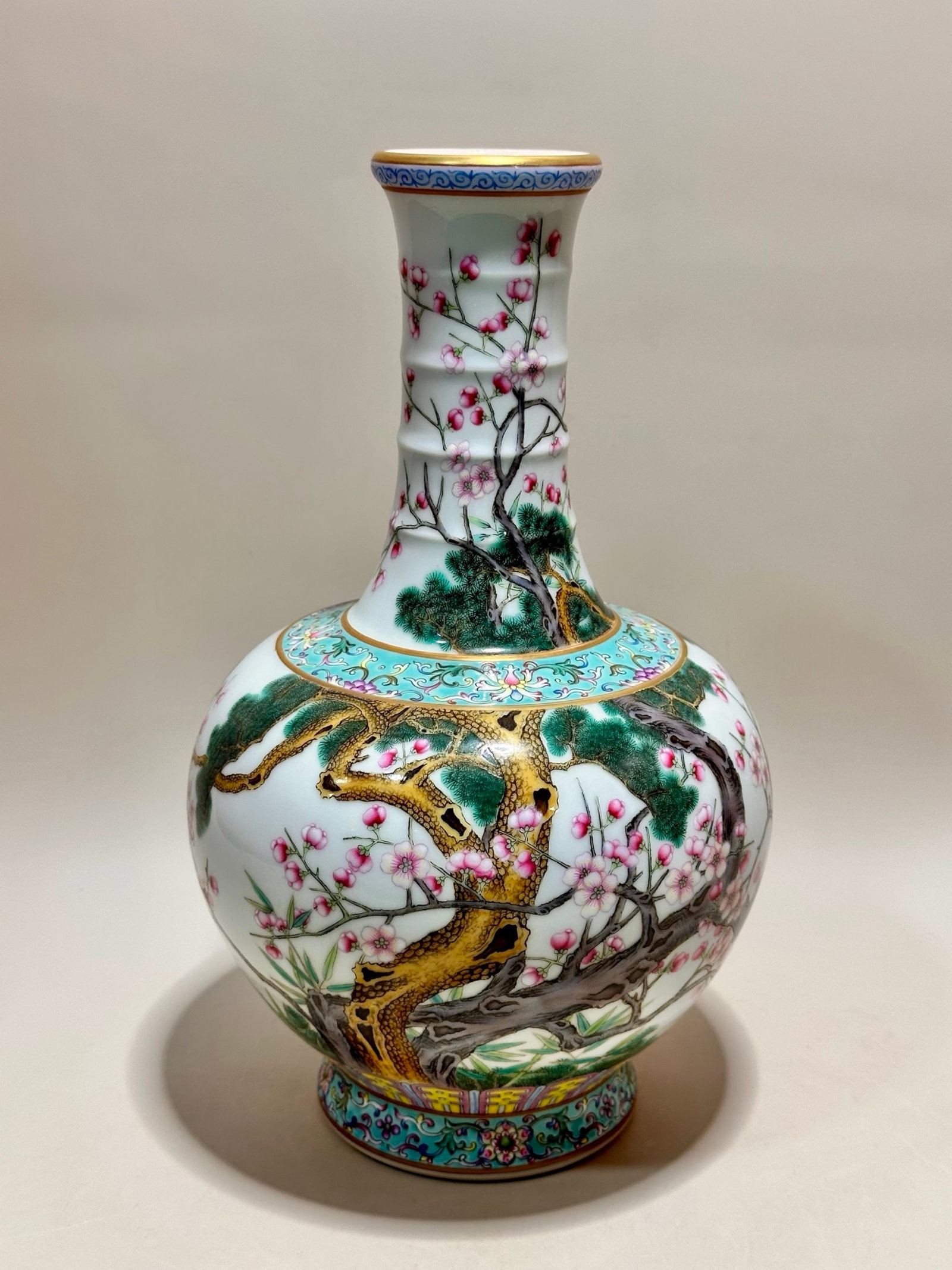 A Rare Famille-Rose Painted Gold Pine,Bamboo and Plum Blossom Pattern Vase: A Rare Famille-Rose Painted Gold Pine,Bamboo and Plum Blossom Pattern Vase,Qing Dynasty,China,Yongzheng Six-character Mark,Size:11.8inx4.1in 粉彩描金松竹梅