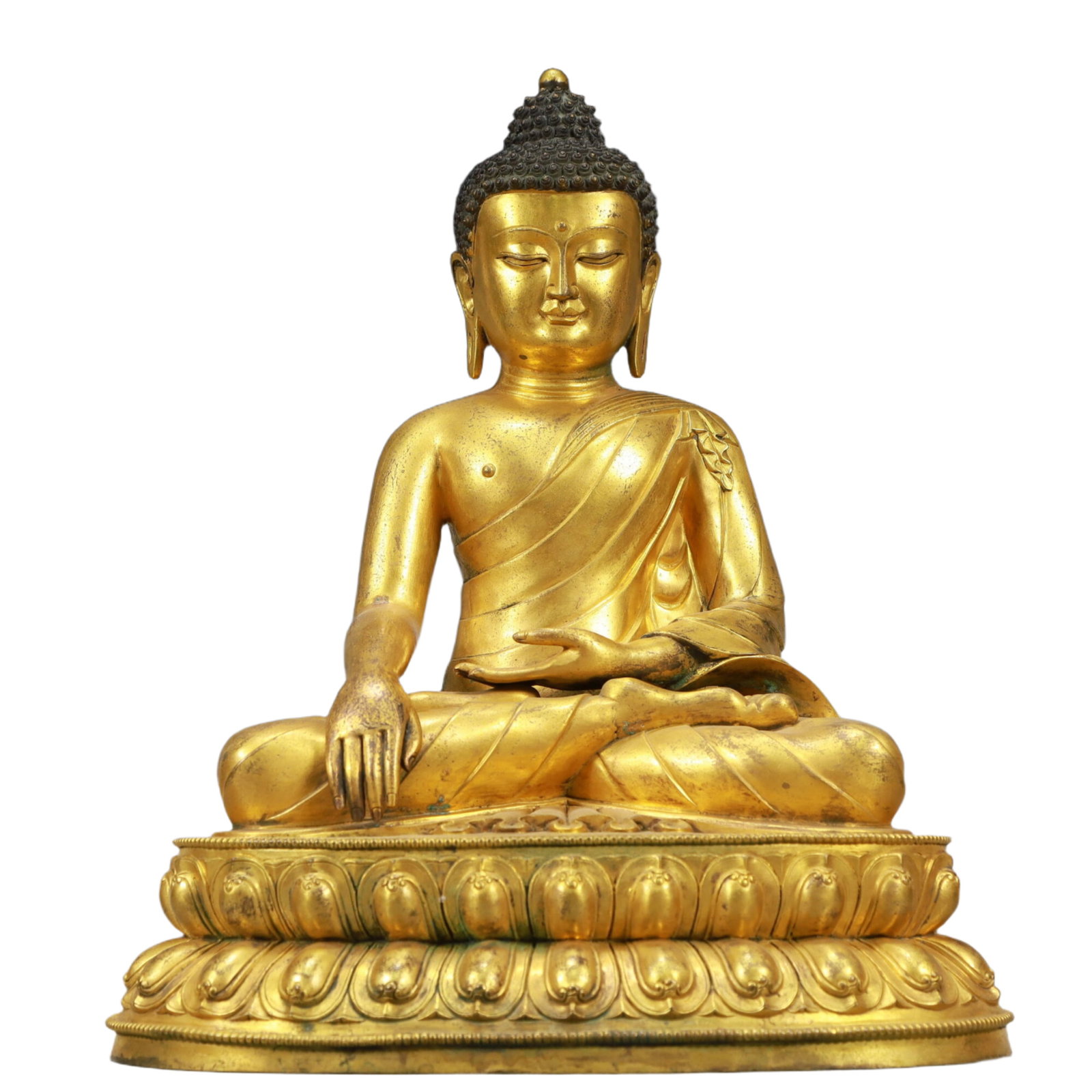 A Fabulous Gilt-Bronze Figure Of Buddha Shakyamuni: A Fabulous Gilt-Bronze Figure Of Buddha Shakyamuni. Superbly and sensitively sculpted in the form of a seated Buddha Shakyamuni,with well-defined arched eyebrows juxtaposed with the prominent nose abo