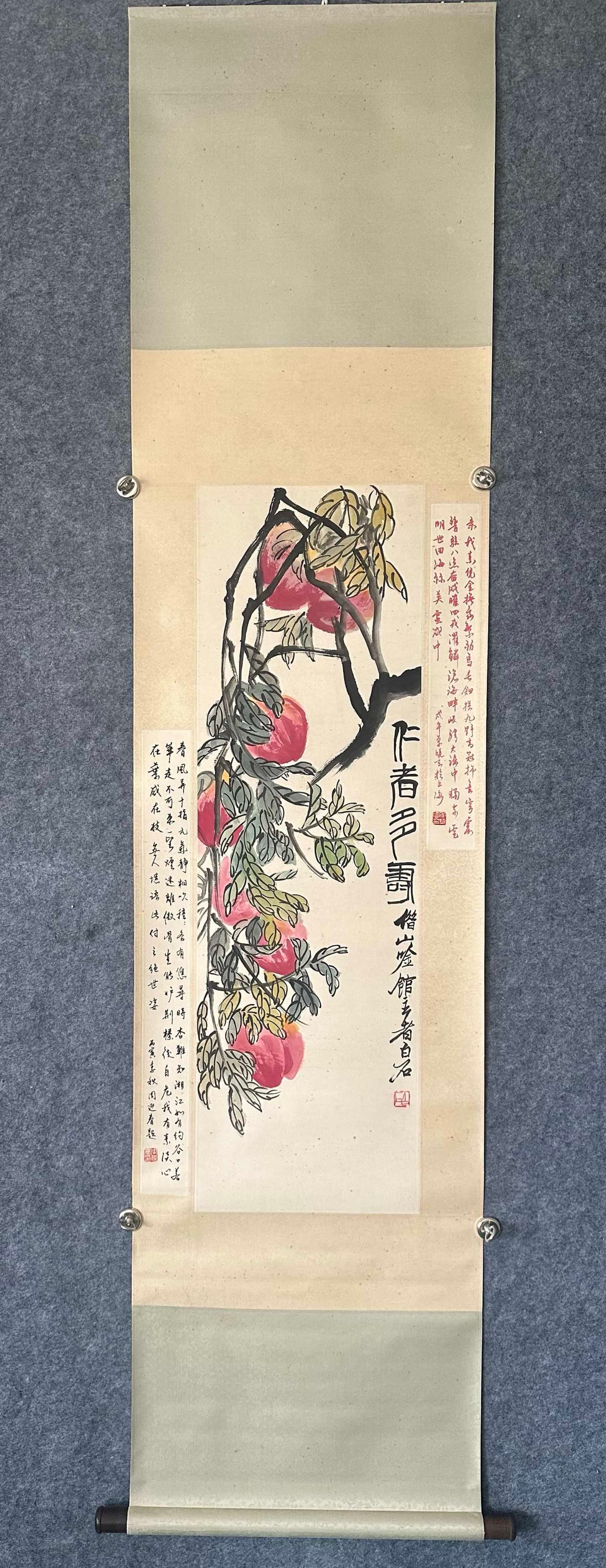 A Chinese Vertical Scroll Ink Painting of Peach on Paper: A Chinese Vertical Scroll Ink Painting of Peach on Paper,Qi Baishi,Size:13.4inx42.9in 一幅中国水墨桃子画立轴,齐白石