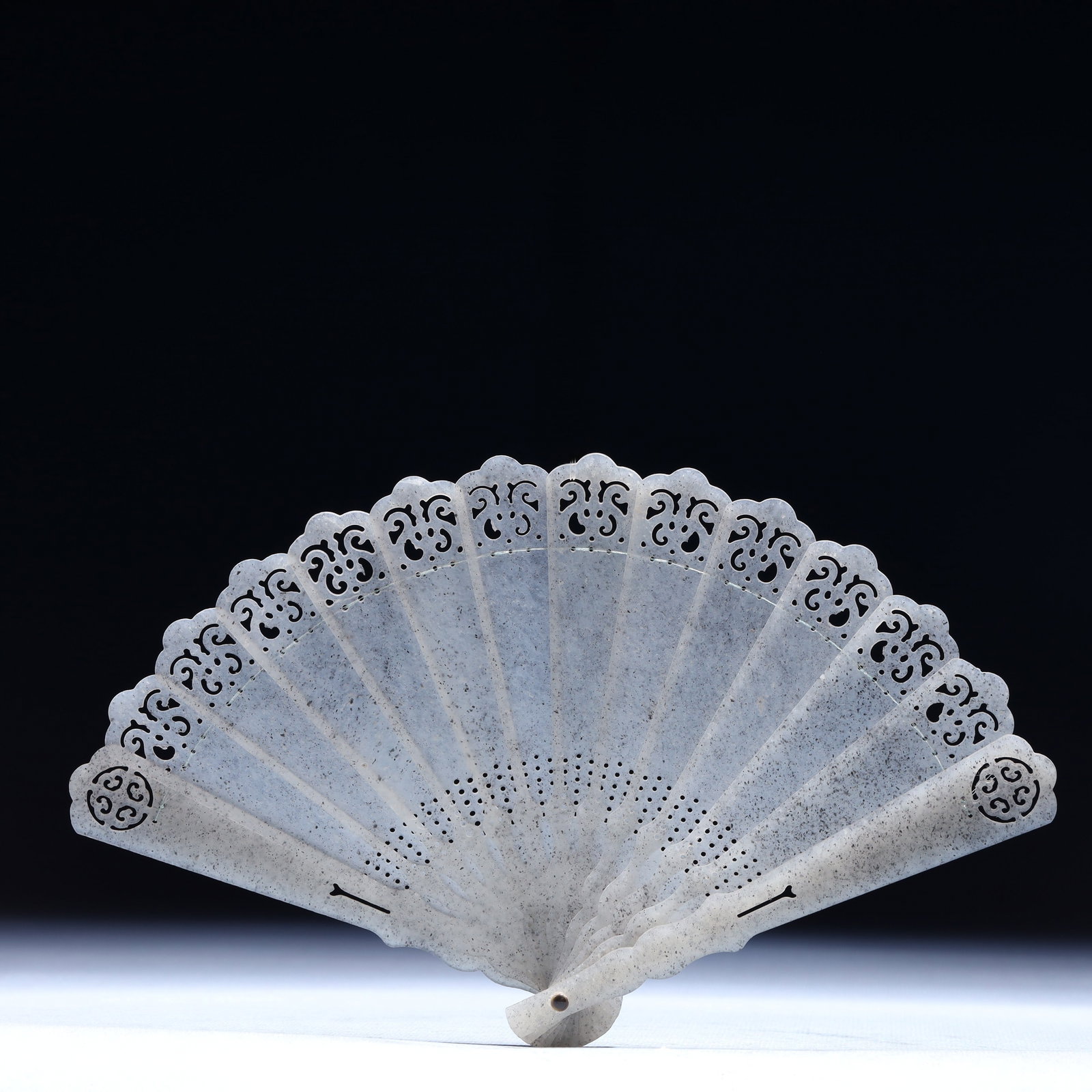 An Exquisite White Jade Lotus Pattern Fan: An Exquisite White Jade Lotus Pattern Fan,Qing Dynasty,China,Size:8.3inx5.1inx0.8in,Weight:74g 白玉缠枝莲纹扇子,中国清代