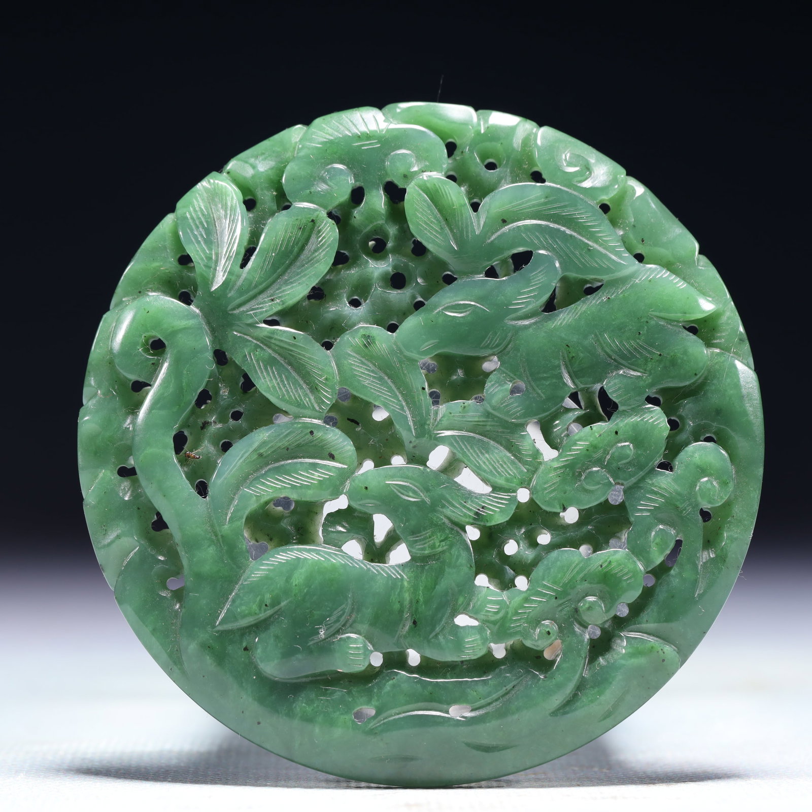 An Exquisite Jasper Deer Pattern Pendant: An Exquisite Jasper Deer Pattern Pendant,Qing Dynasty,China,Size:3inx3in,Weight:71.2g 碧玉鹿纹佩,中国清代