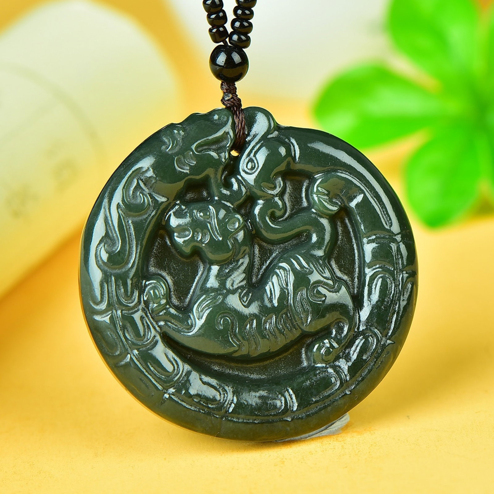 An Exquisite Jasper Auspicious Beast Pattern Pendant: An Exquisite Jasper Auspicious Beast Pattern Pendant,Size:50mmx50mm 碧玉瑞兽纹挂件