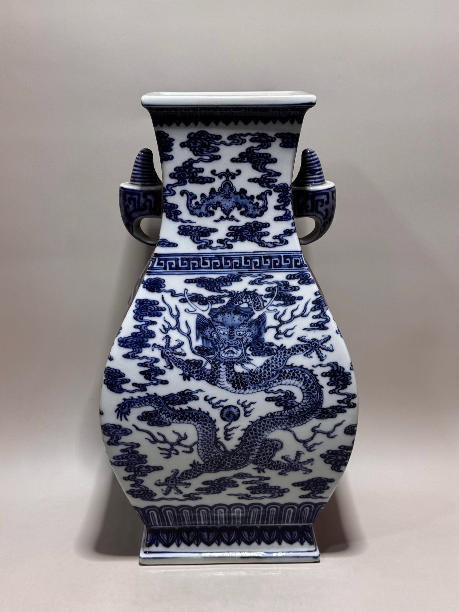 A Rare Blue and White Dragon and Phoenix Pattern Double-Ears Vase: A Rare Blue and White Dragon and Phoenix Pattern Double-Ears Vase,Qing Dynasty,China,Qianlong Six-character Mark,Size:15.1inx8.1in 青花龙凤纹双耳瓶,