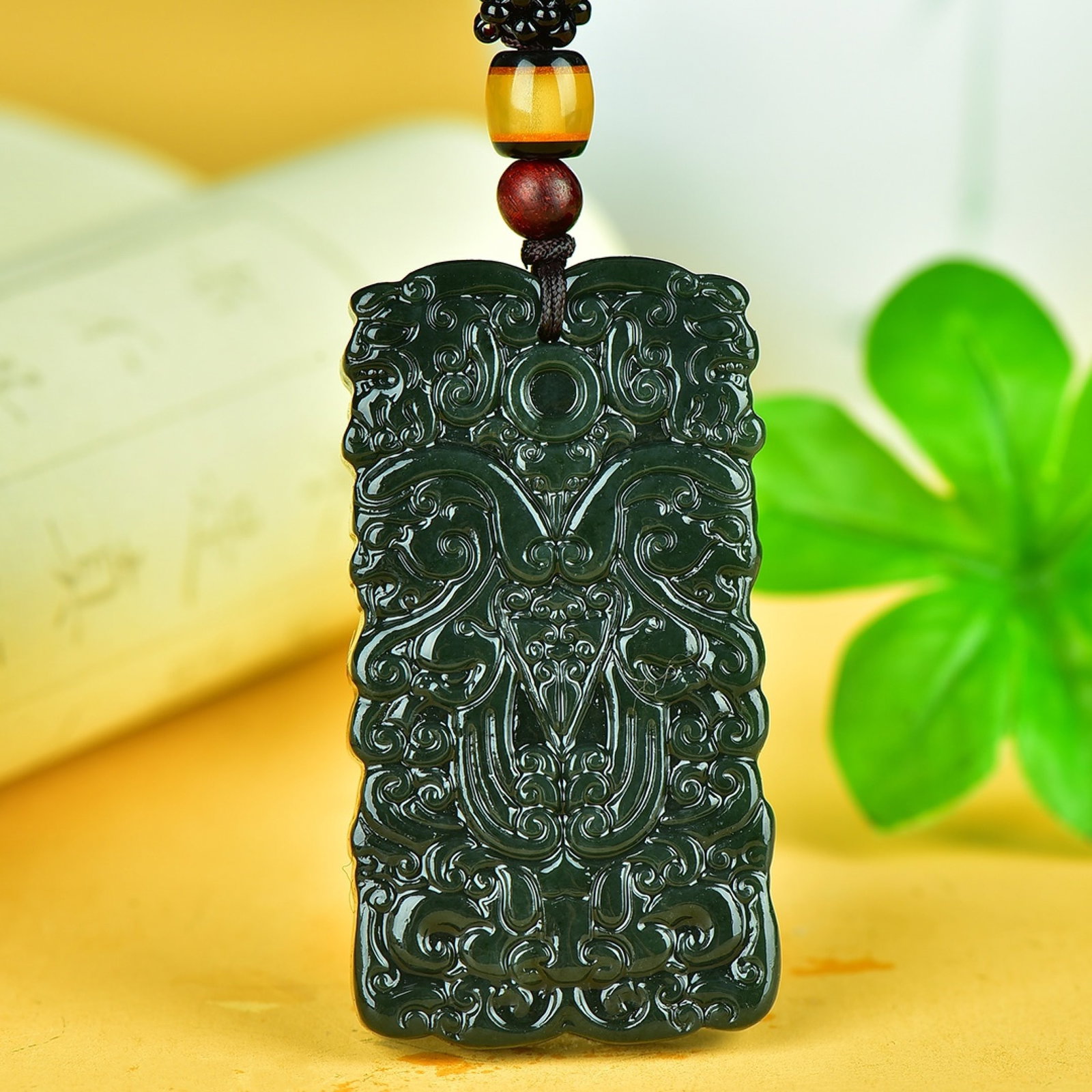 An Exquisite Jasper Auspicious Beast Pattern Pendant: An Exquisite Jasper Auspicious Beast Pattern Pendant,Size:31mmx57mm 碧玉瑞兽纹挂件