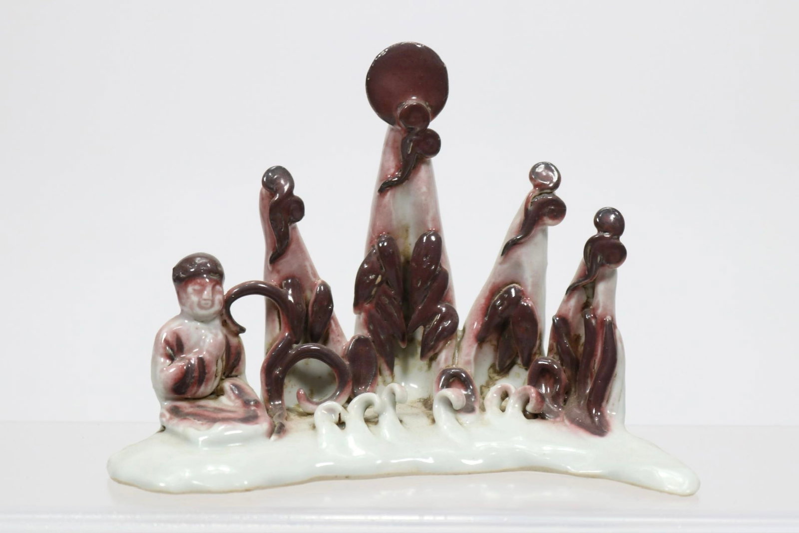 A fine underglaze red mountain-form brush rest (1 of 6)
