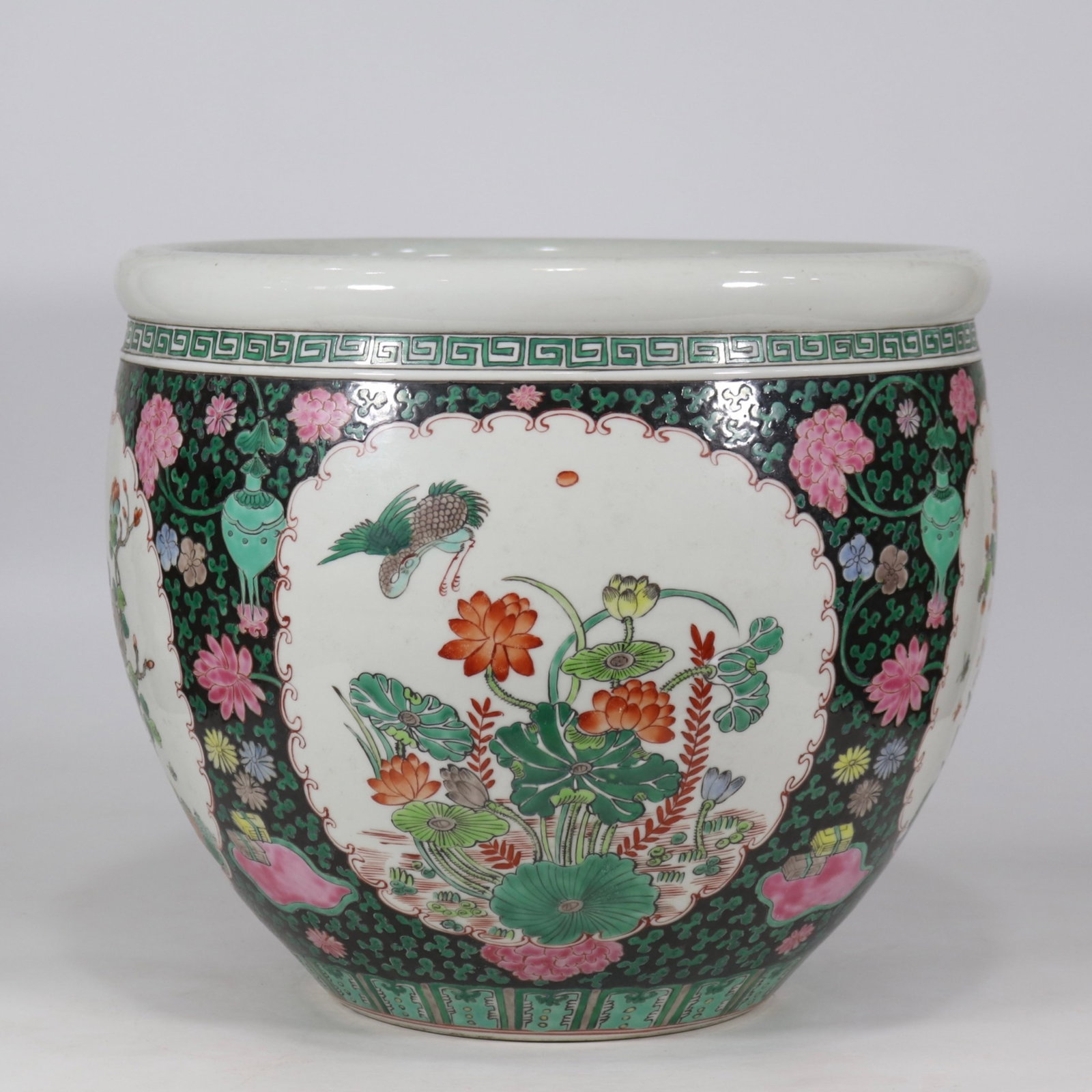 A fine wucai large jar with reserved flower-bird panel: A fine wucai large jar with reserved flower-bird panel, Qing Dynasty, China, with six-character Kangxi reign mark, Size:13.5inx15.4inA fine wucai large jar with reserved flower-bird panel, Qing Dynast