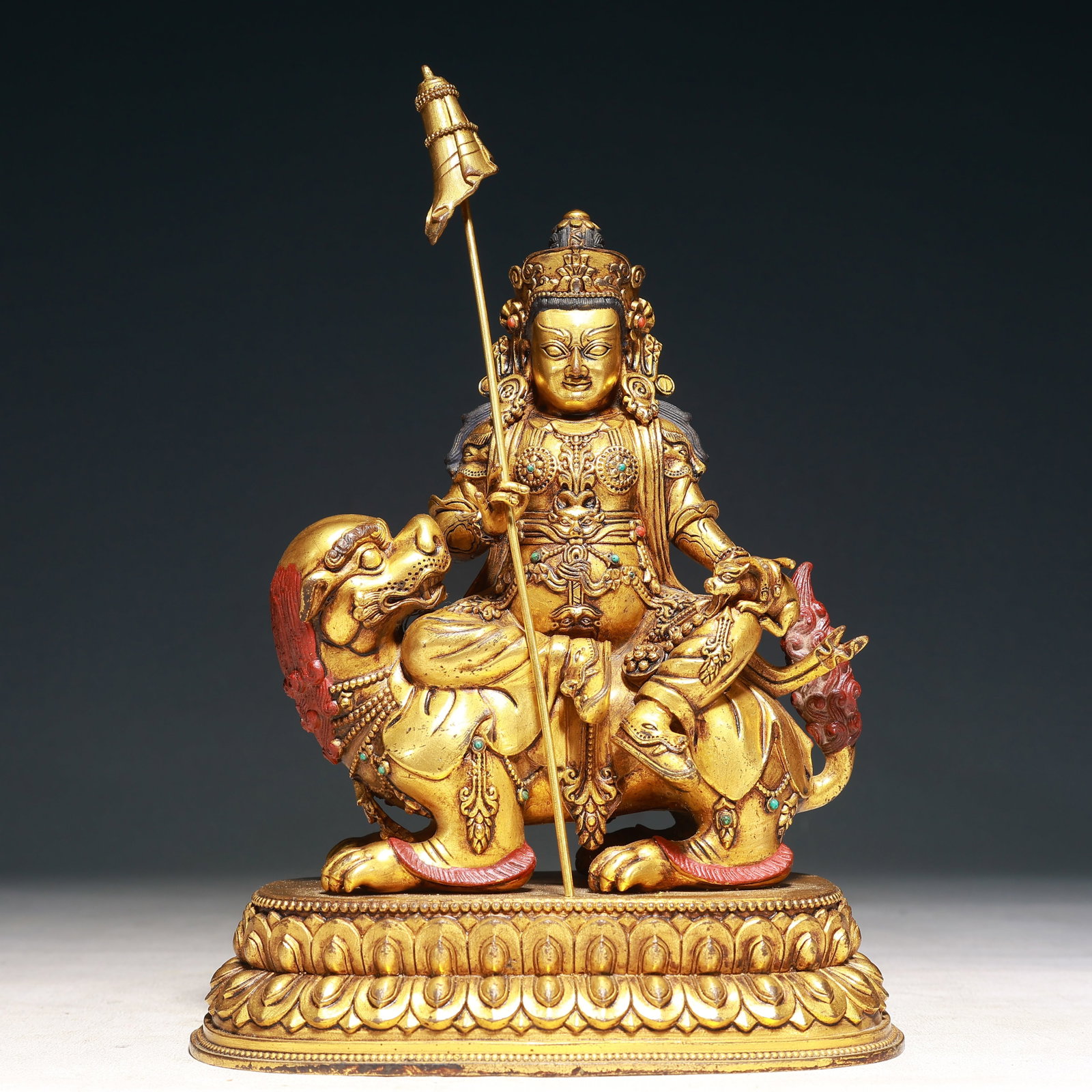 A Solemn Gilt Bronze Statue of Heavenly King Rides the Lion,Inlaid Turquoise: A Solemn Gilt Bronze Statue of Heavenly King Rides the Lion,Inlaid Turquoise,Qing Dynasty,China,Size:6.7inx4.3inx10.2in,Weight:2900g 铜鎏金骑狮天王像,&#